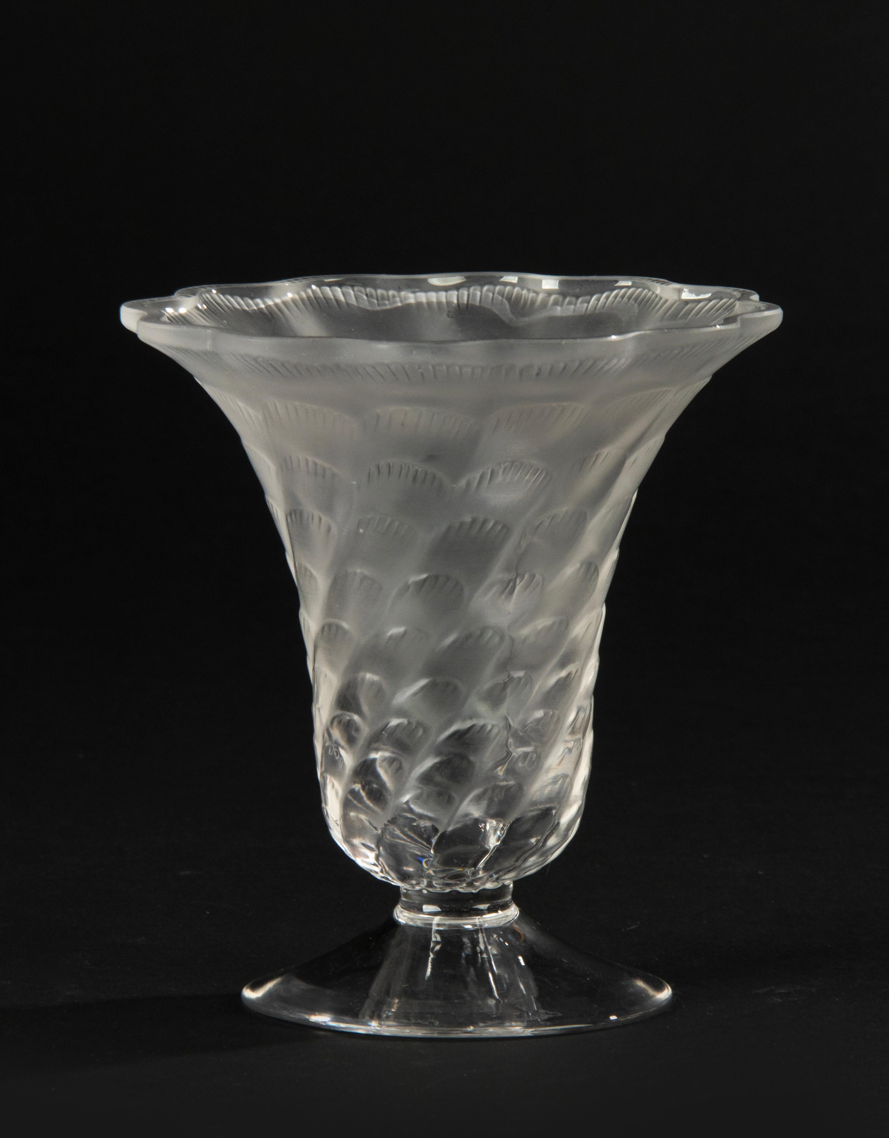 A beautiful little vase, made by the French maker Lalique. Beautiful relief decorations, satin-finished crystal. Marked on the bottom.
The vase is in very good condition.

