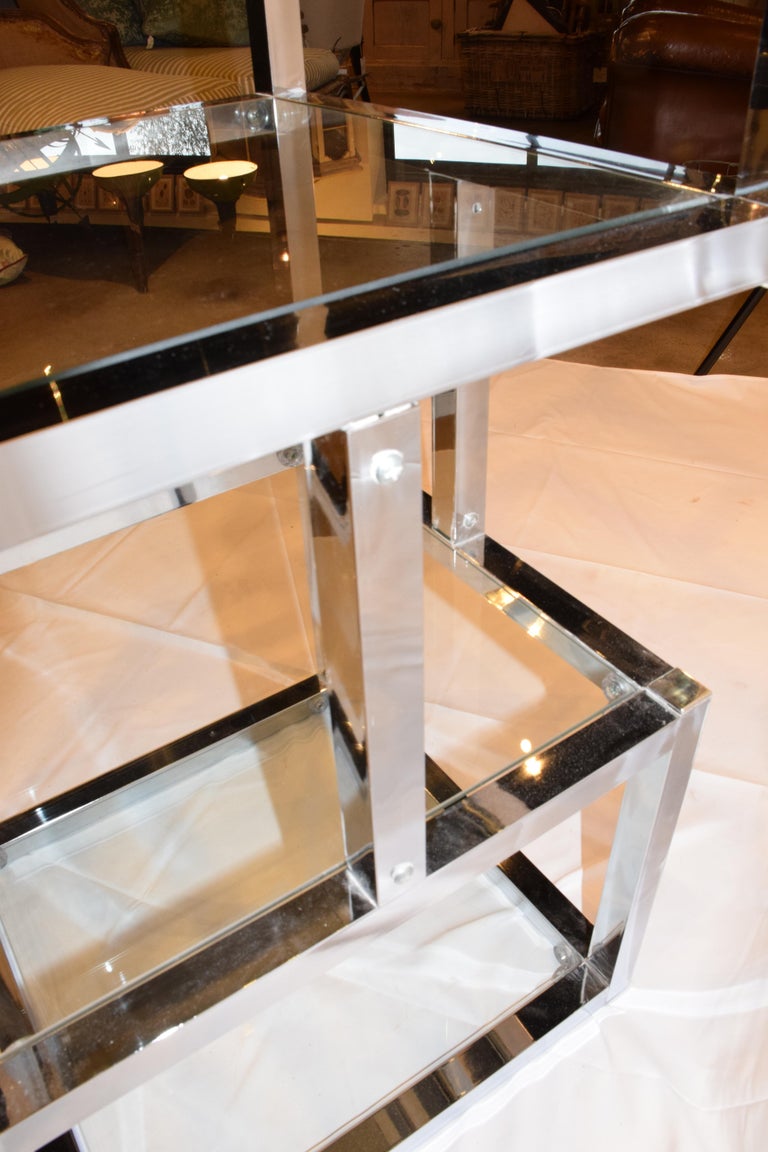 Mid-Century Modern Cube Chrome and Glass Étagère at 1stdibs The painting over the storage cabinet adds character to an already characterized room that.