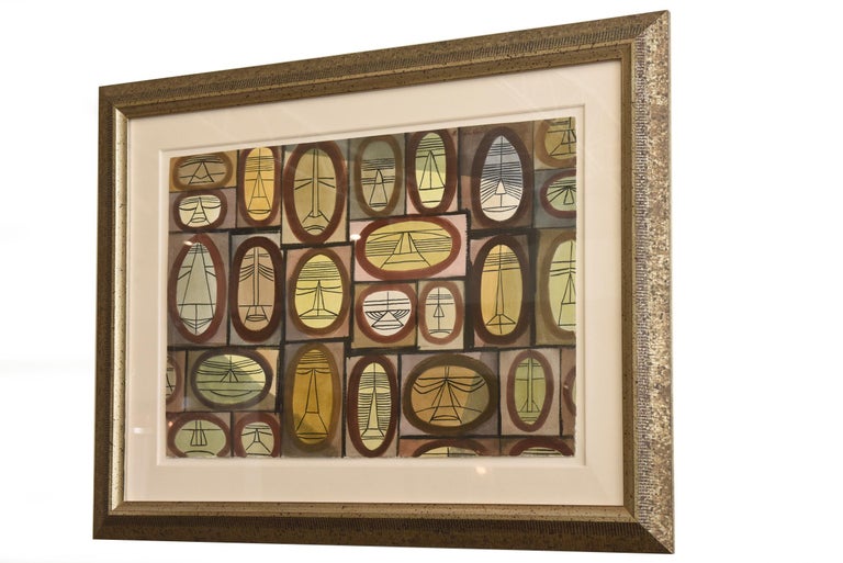 This Mid-Century Modern one of a kind horizontal watercolor by William Henry is a combination of cubist individual faces with African influences. Each face is outlined forming an oblong or circle which is then outlined in a black rectangular or