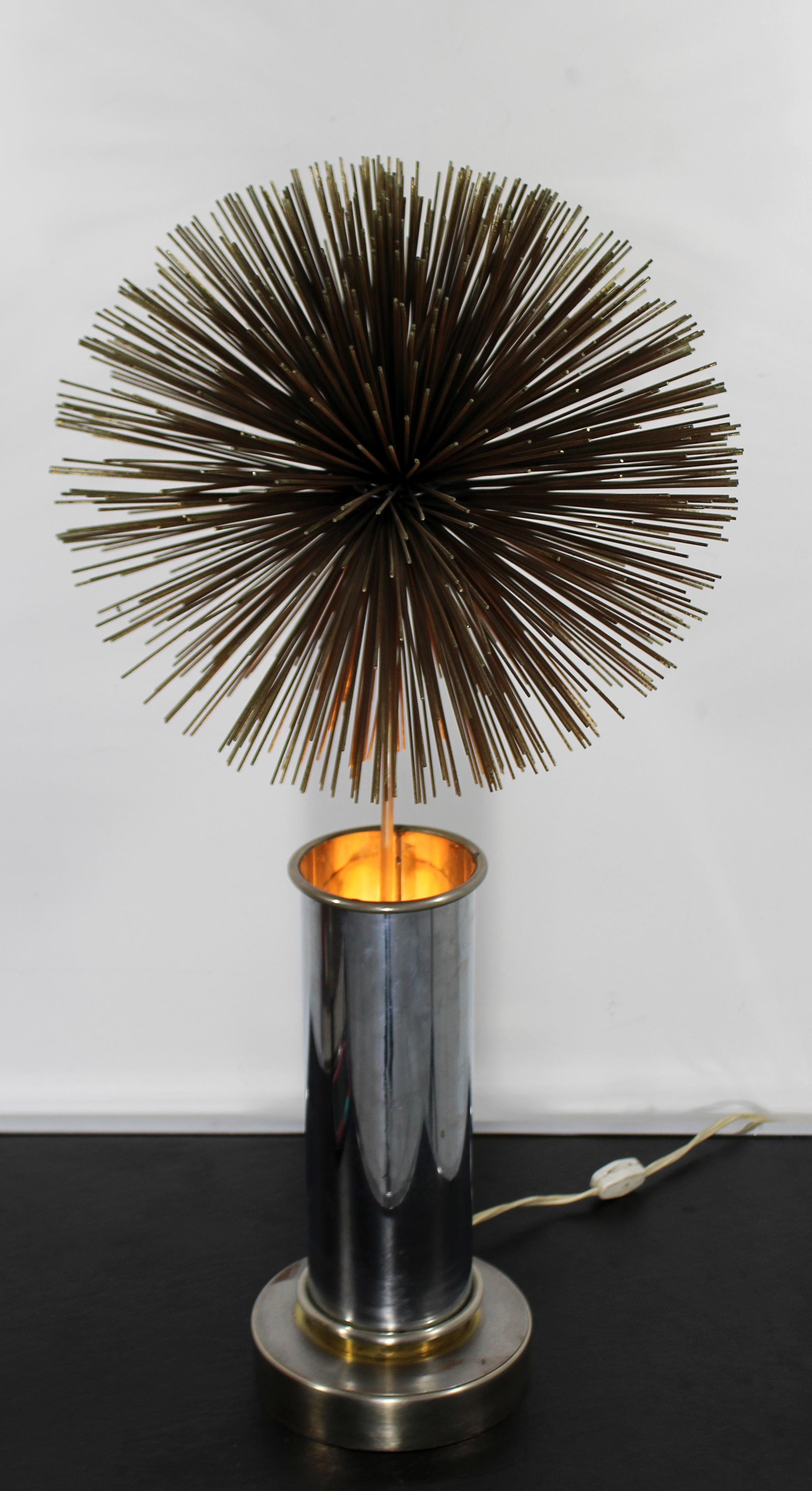 For your consideration is an understated, spiky pom pom table lamp, in mixed metals, by Curtis Jere, circa the 1960s. In excellent condition. The dimensions are 12