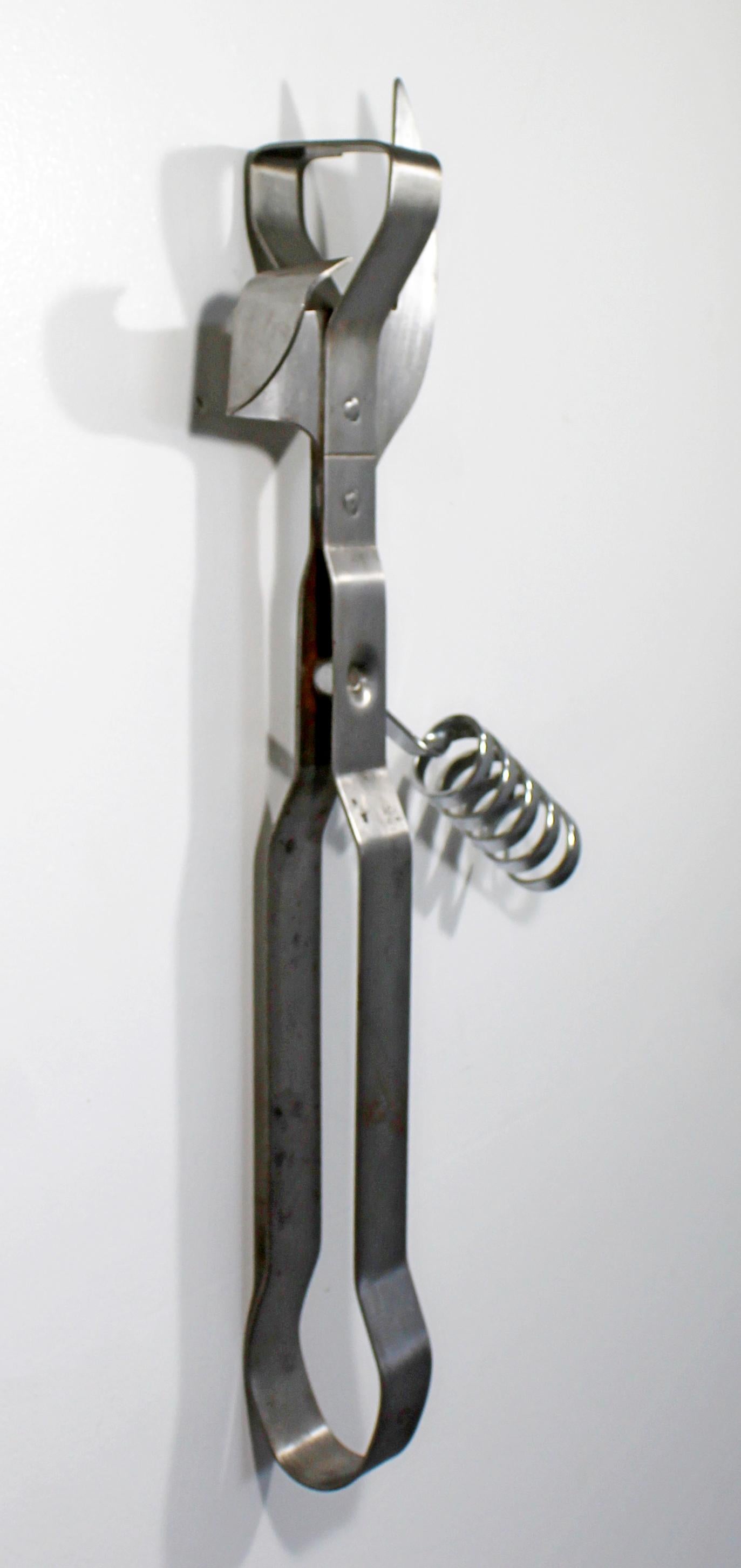 Mid-Century Modern Curtis Jere Style Can Opener Metal Wall Sculpture, 1970s In Good Condition In Keego Harbor, MI