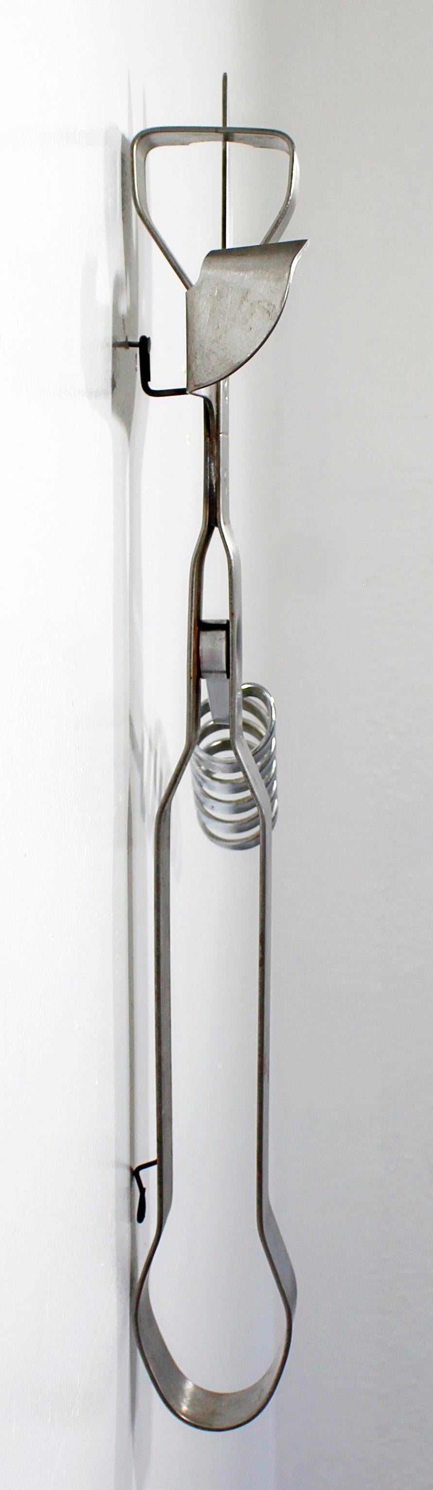 Late 20th Century Mid-Century Modern Curtis Jere Style Can Opener Metal Wall Sculpture, 1970s