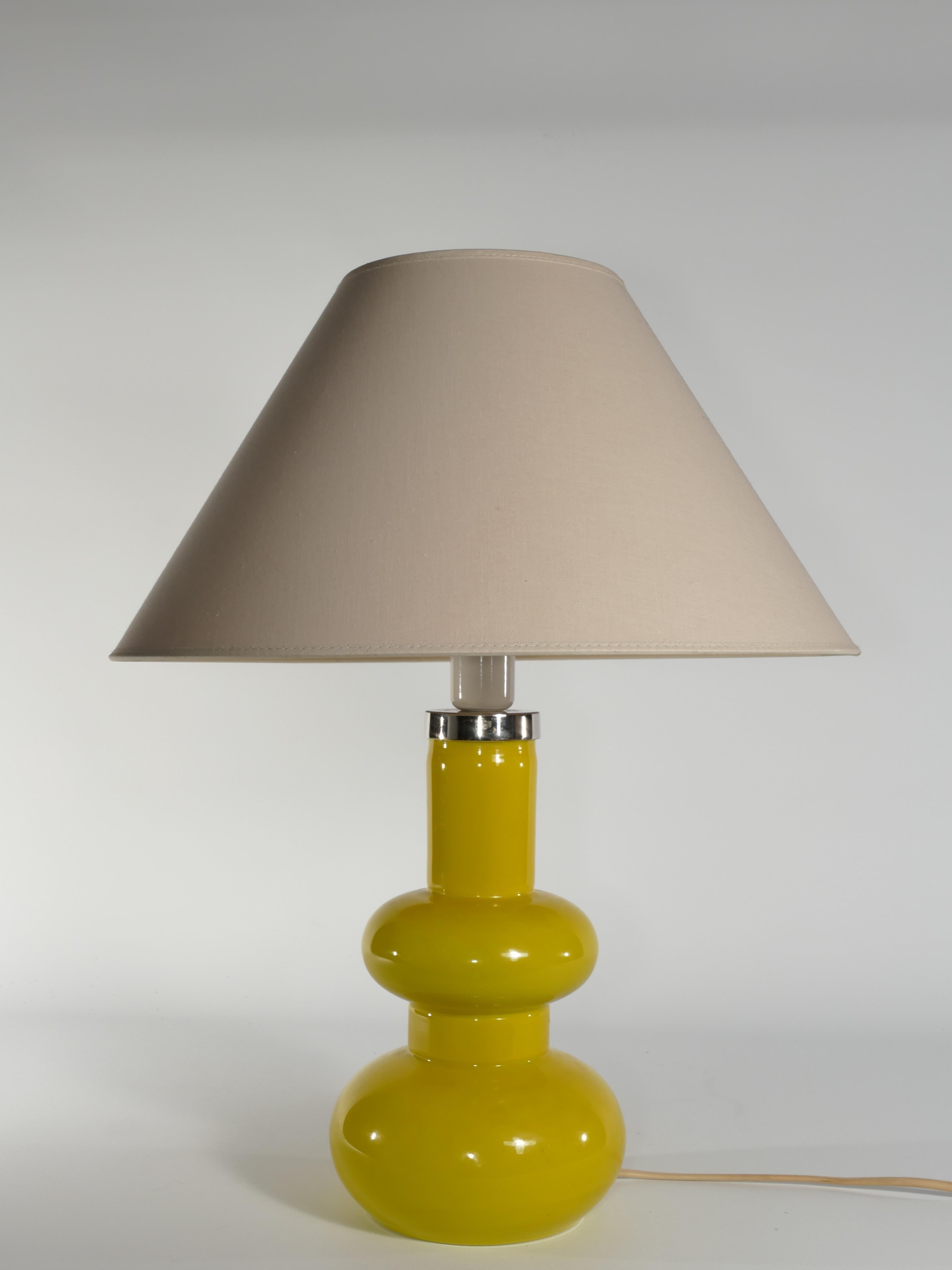 Swedish Mid-Century Modern Curvaceous Bright Yellow Glass Table Lamp by Orrefors, 1960s For Sale