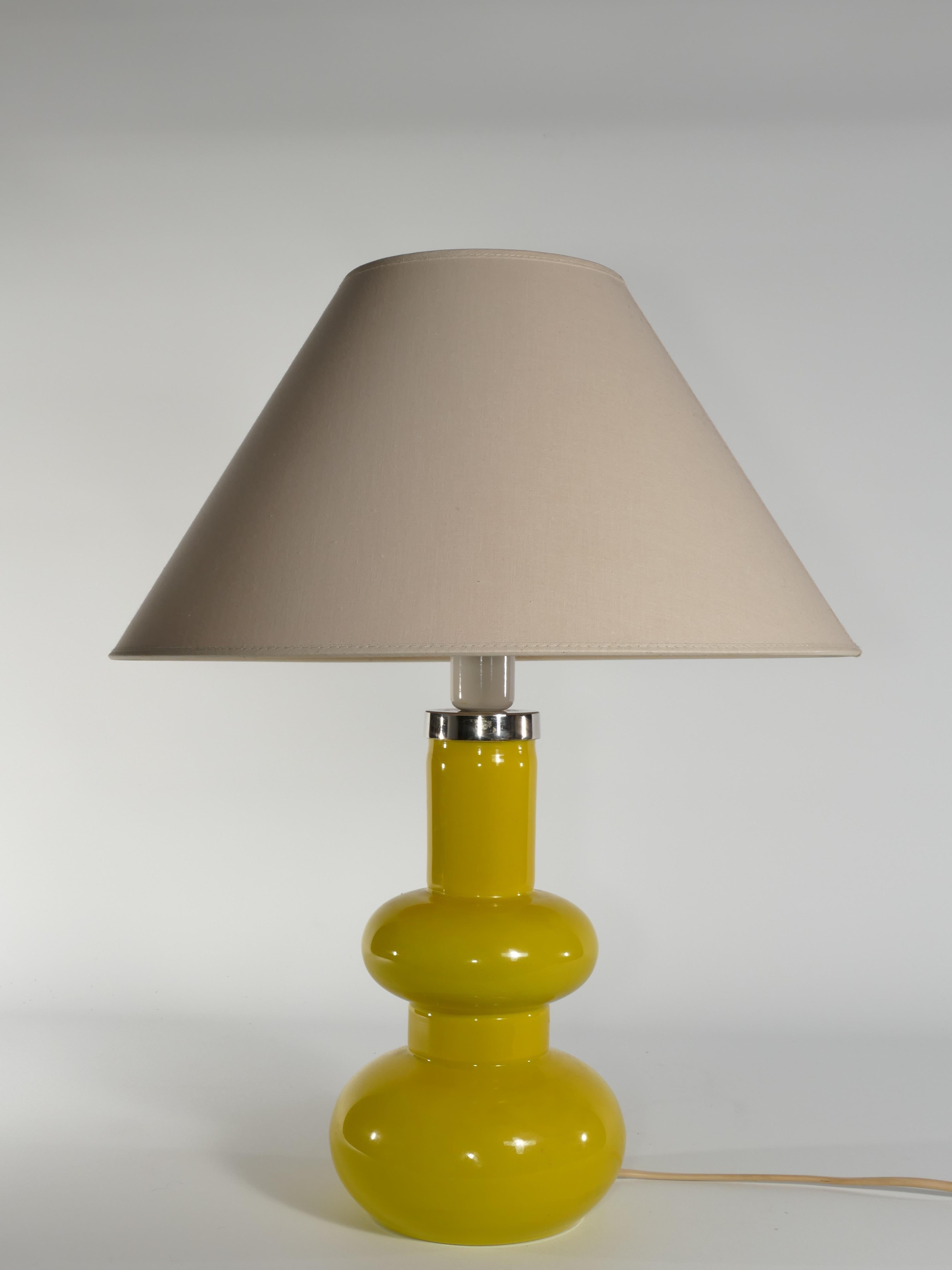 Hand-Crafted Mid-Century Modern Curvaceous Bright Yellow Glass Table Lamp by Orrefors, 1960s For Sale