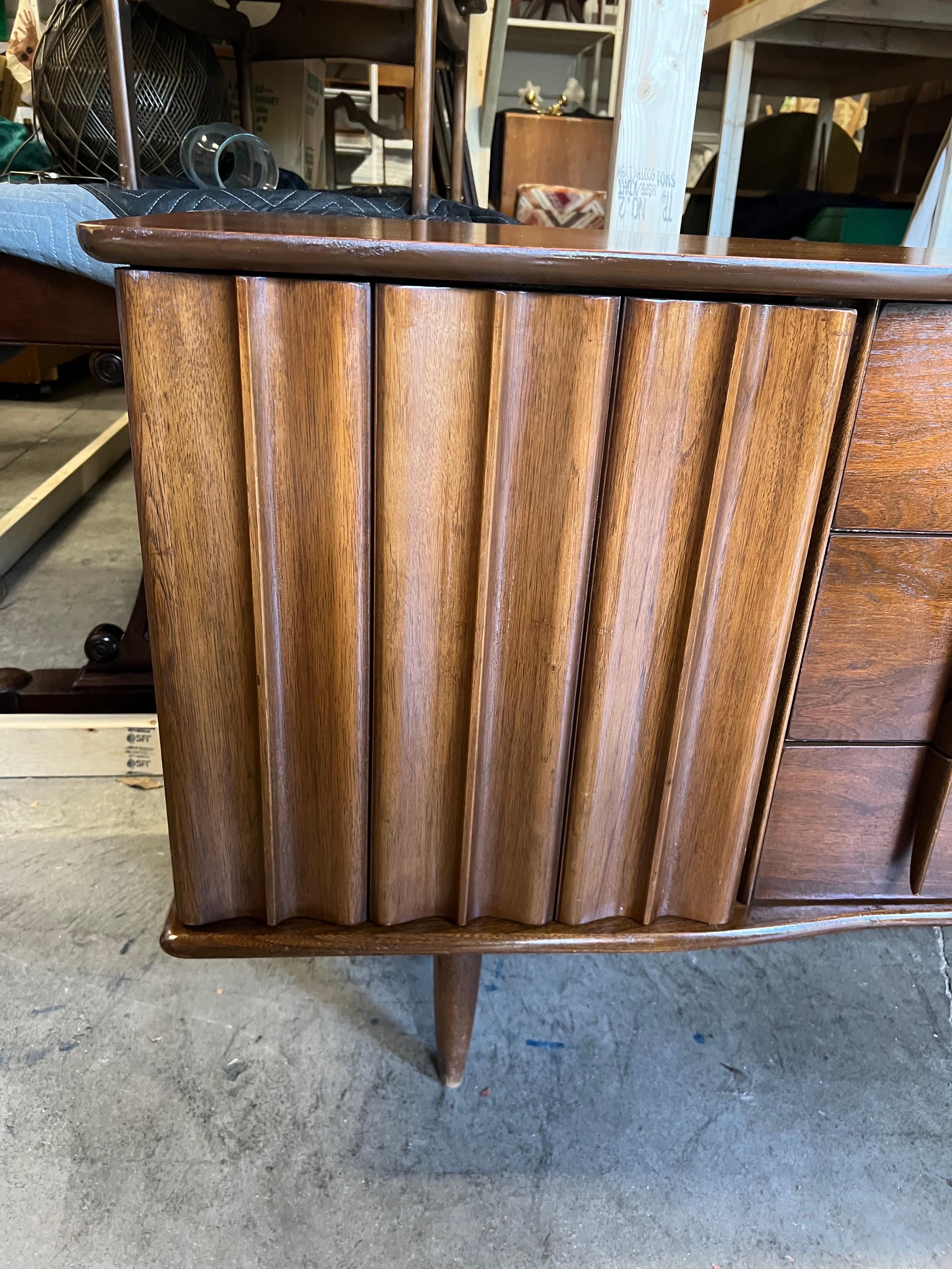 American Mid-Century Modern Curved and Sculpted Walnut Lowboy Dresser For Sale