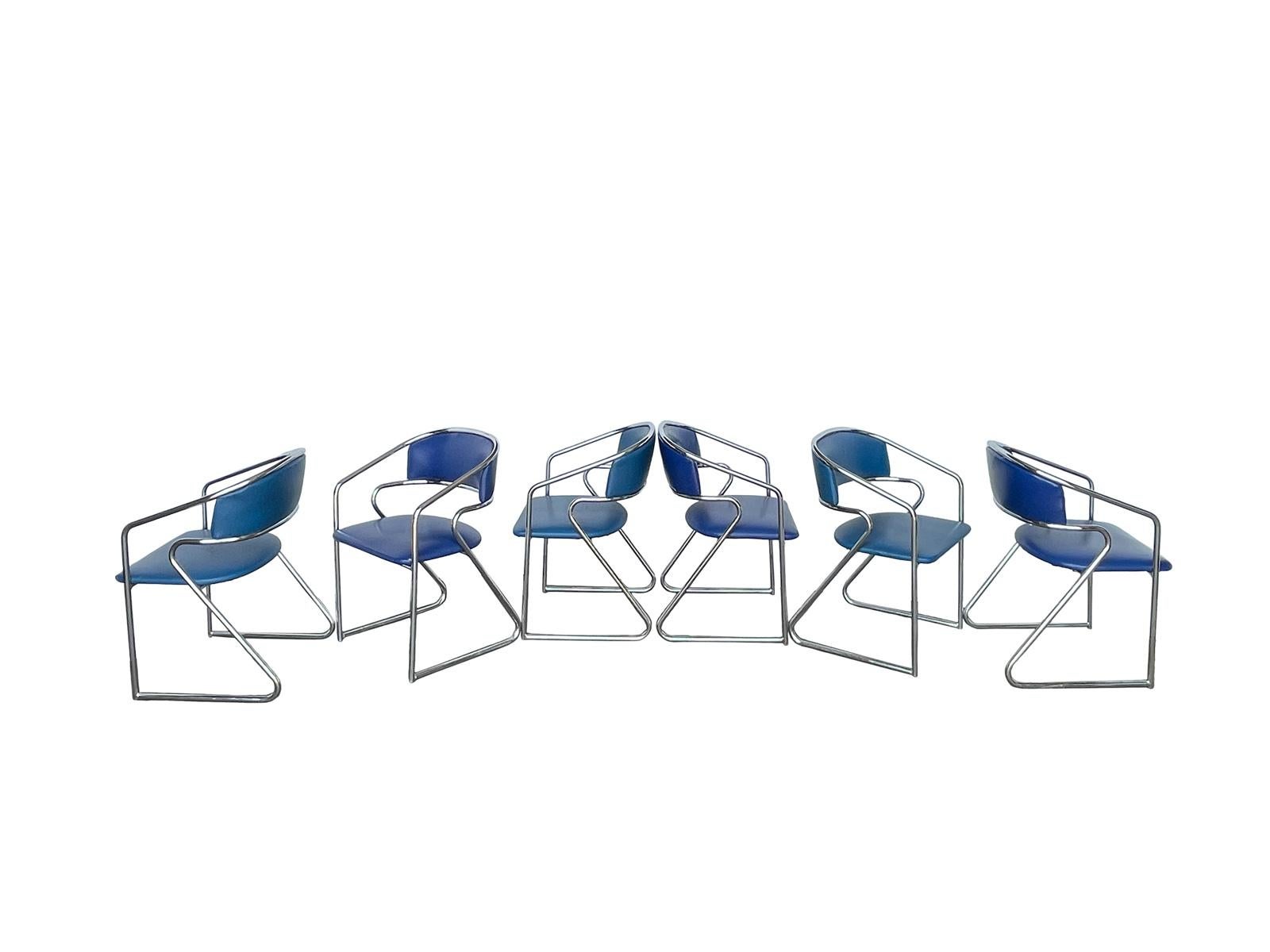 Set of 6 curved armchairs with tubular chrome frame and vinyl upholstery, circa mid-20th century. Manufactured by Loewenstein in Pompano Beach, Florida.imported from Italy 2 different shades of blue I also have more if interested 