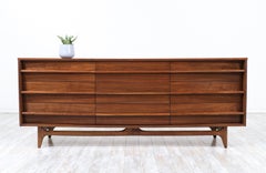 Mid-Century Modern Curved-Front Walnut Dresser by United Furniture