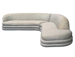 Sofá seccional curvado en forma de L y chaise longue Art Déco de mediados de siglo
