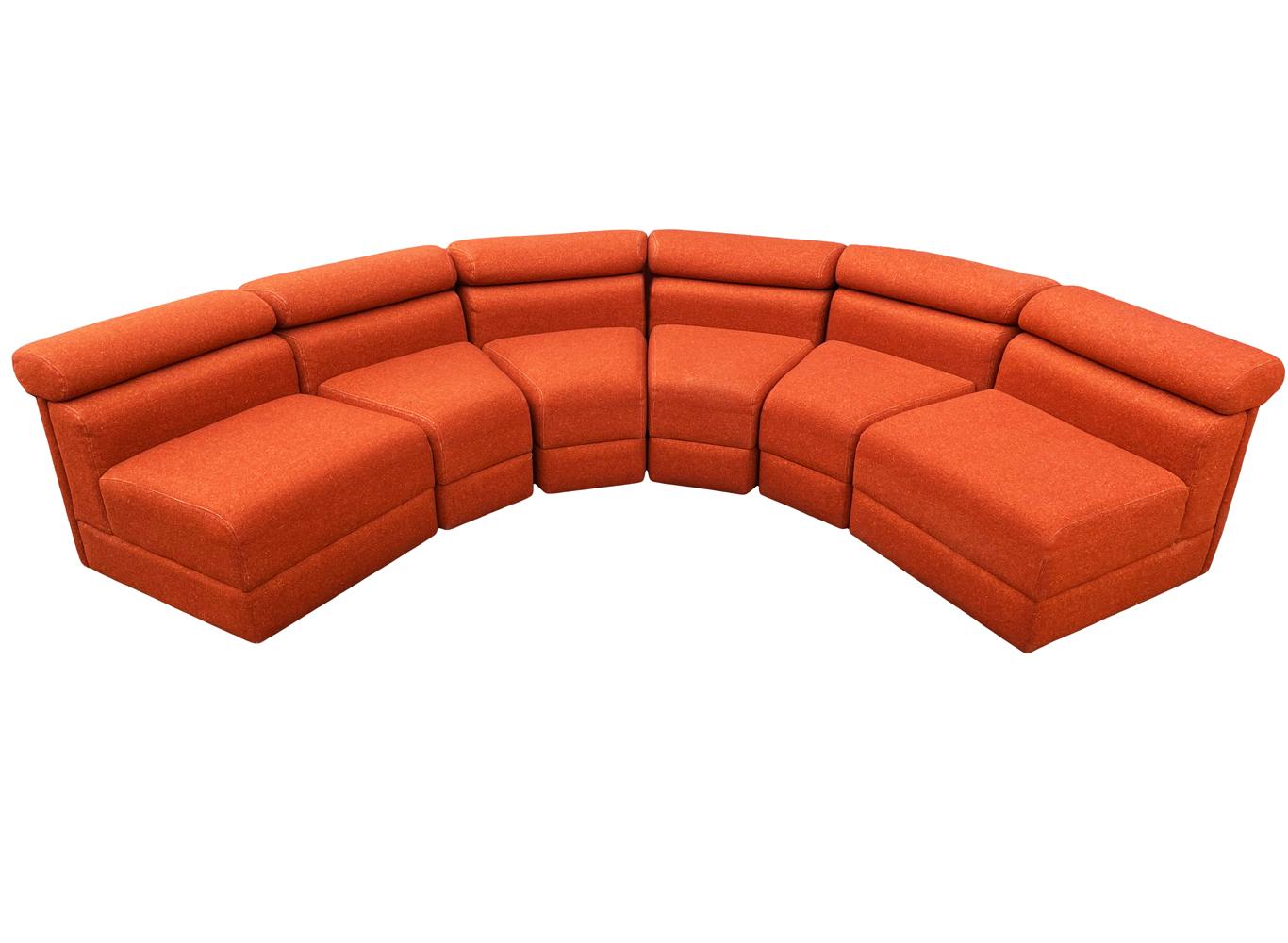 orange curved sofa