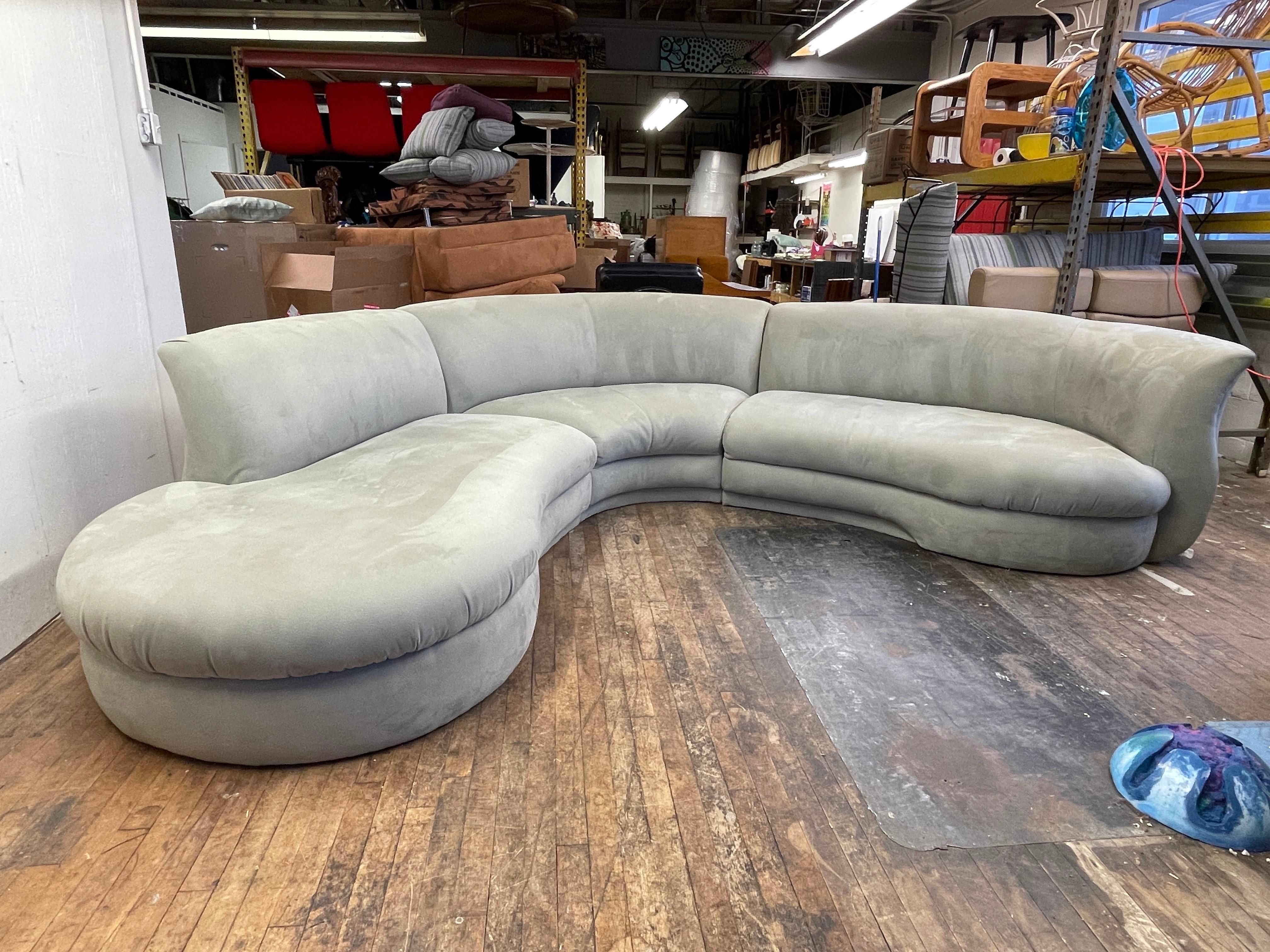 A classy cloud sofa in very light pastel mint green fabric with many great curves. This piece is commonly listed as a Weiman design, there is currently an identical one on 1st Dibs for three times this price. The sectional is in three parts. They
