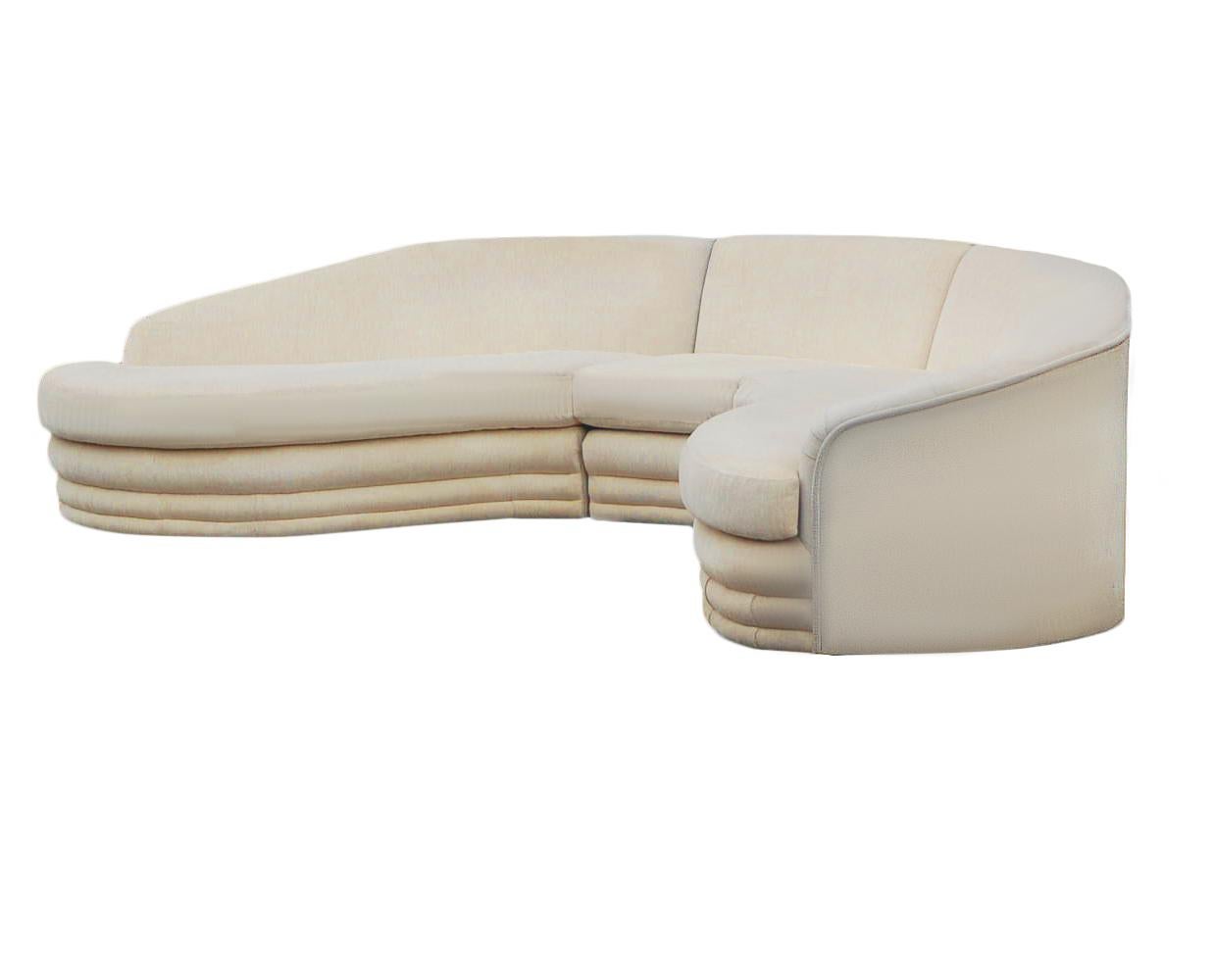 A stunning 3-piece semi-circular sofa, circa 1970s. This sofa can be used with 2 or 3 sections. It is well made and still retains its original off-white velour upholstery.