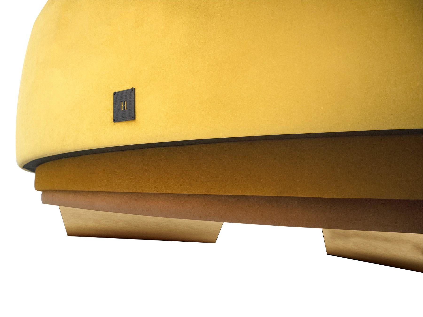 yellow curved sofa