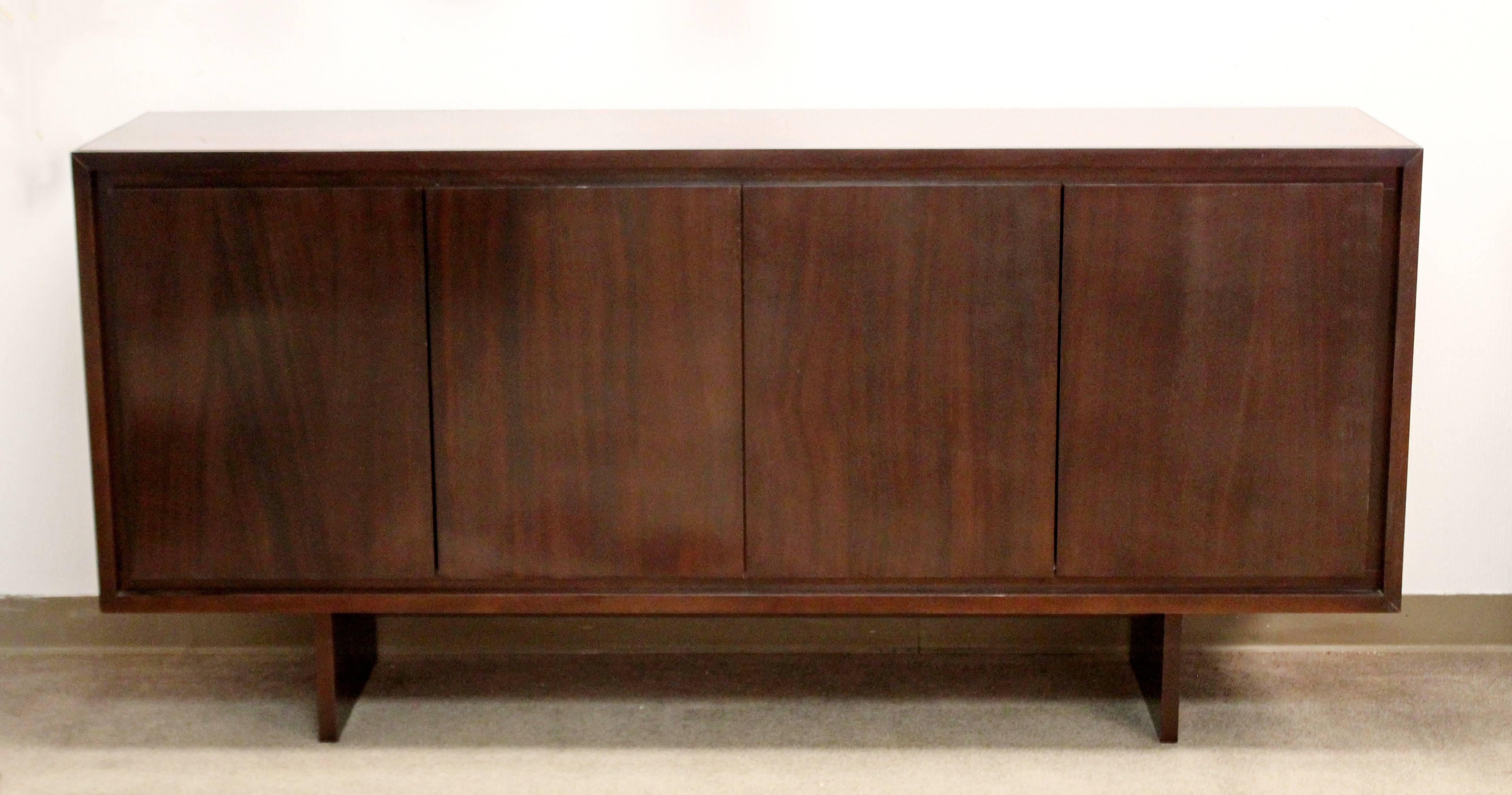 For your consideration is a fantastic, large credenza, with a rare red granite top, and two shelves, custom-made in the style of Baker. In excellent condition. The dimensions are 75.5
