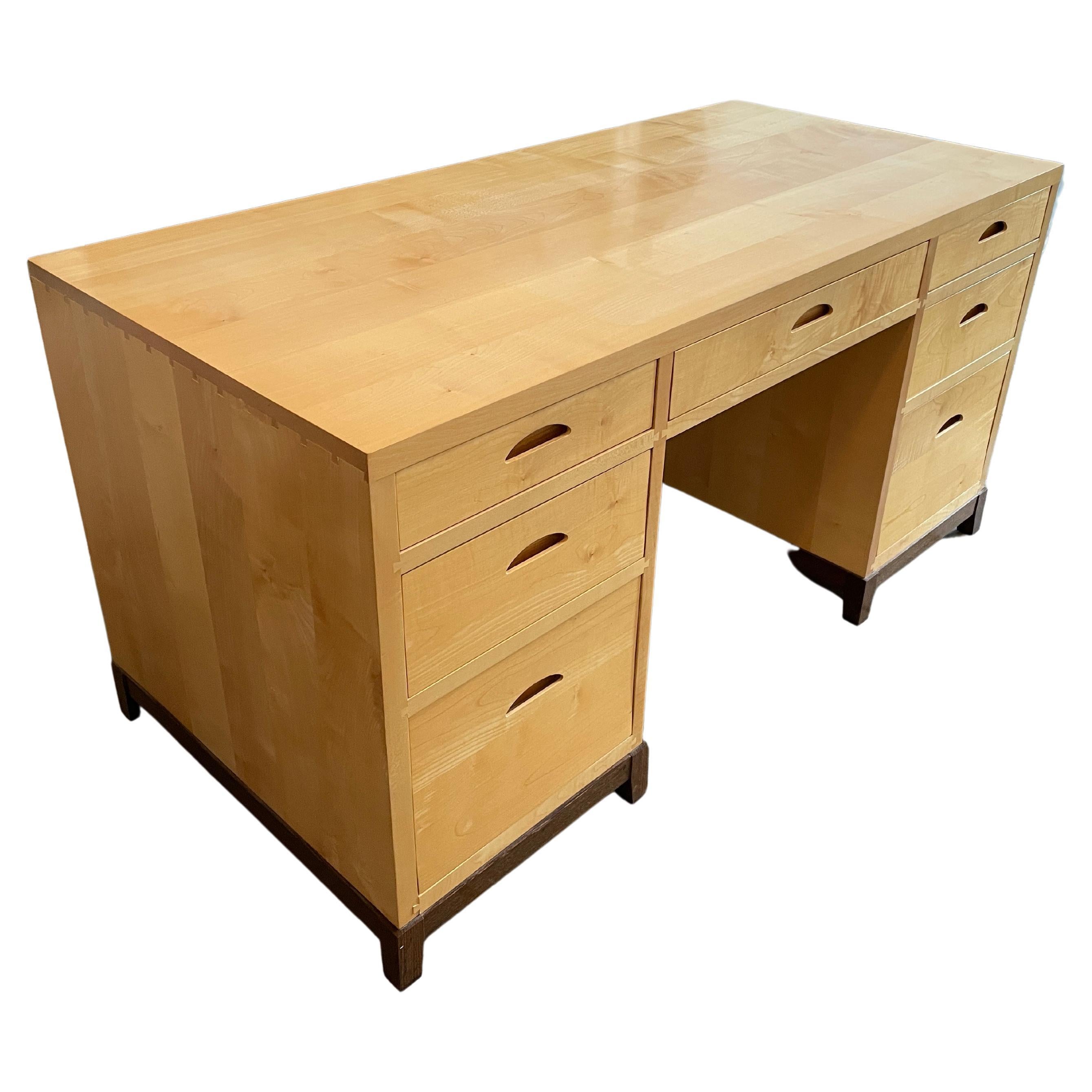 Beautiful Unique American Studio craft custom woodworker made 7 drawer knee hole Solid Blonde Maple desk. Scandinavian inspired design and inset carved handles with Japanese influenced joints used throughout the desk construction. Very clean inside