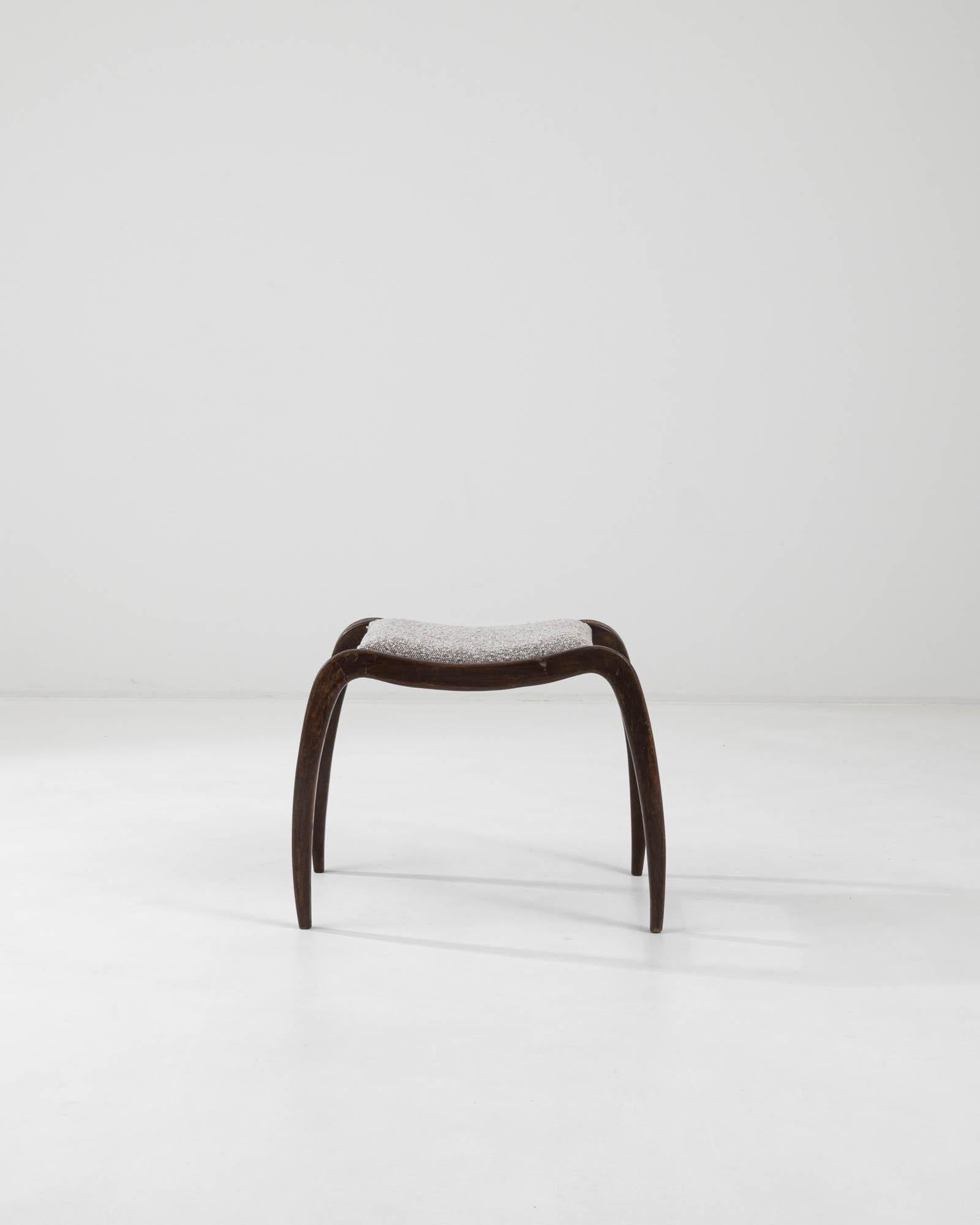 A captivating piece that embodies the essence of Mid-Century Central European design, this petite stool gracefully combines forthright utility with an effortlessly sleek demeanor, making it a delightful addition to any living space.

With a design