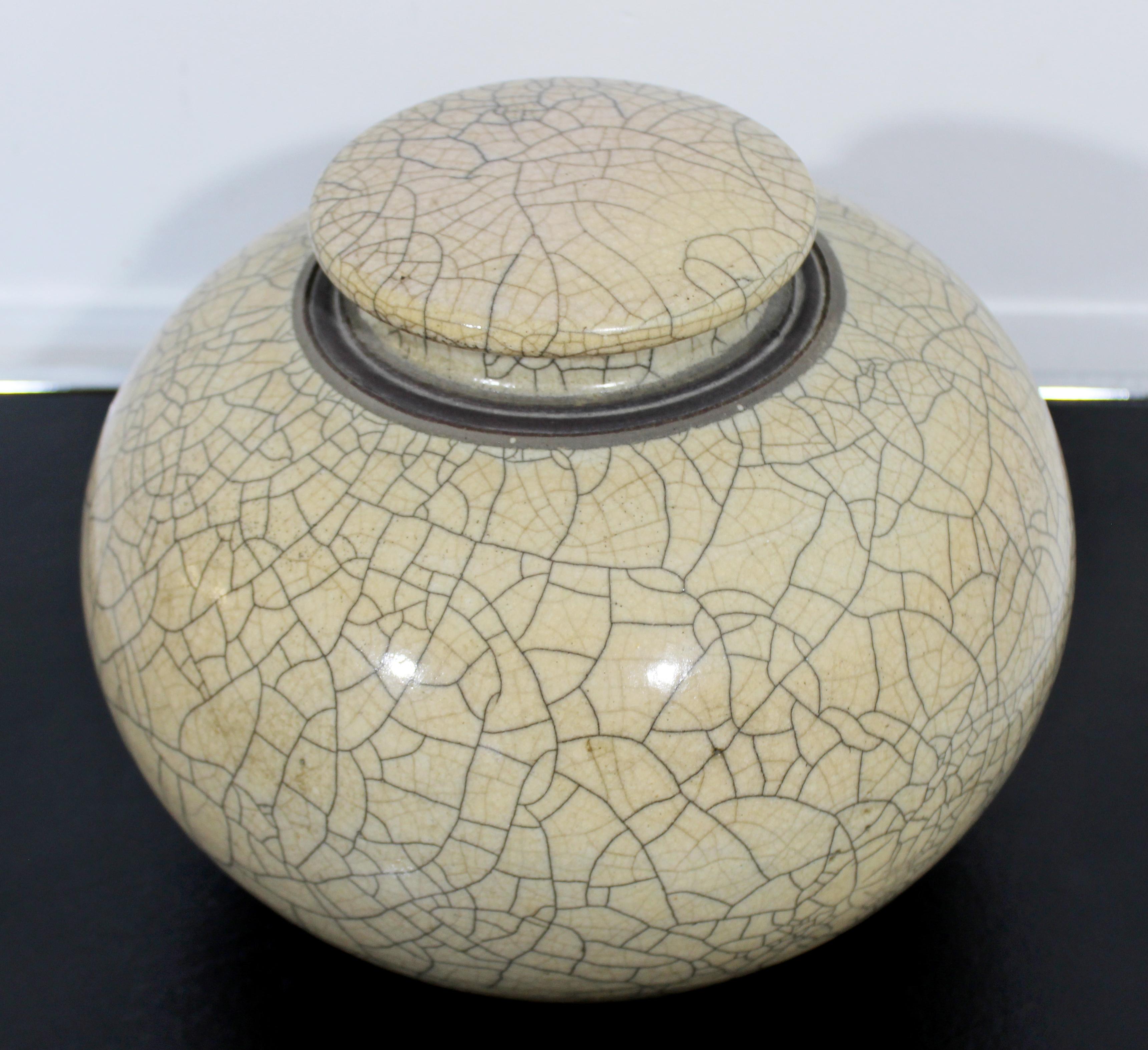 For your consideration is a stunning, Poplar studio ceramic lidded vessel, signed by Dale Raddatz. Born in 1945 Raddatz is a well known sculptor and potter. He has extensive knowledge in both kiln and foundry design. In excellent condition. The