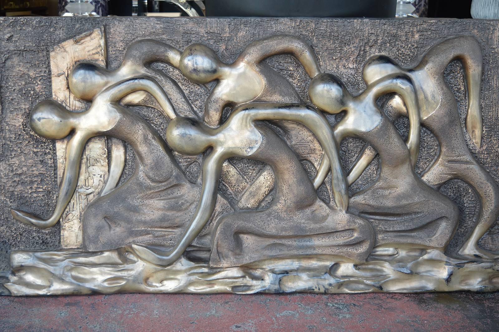 Fiberglass wall sculpture of dancers by Finesse Original.