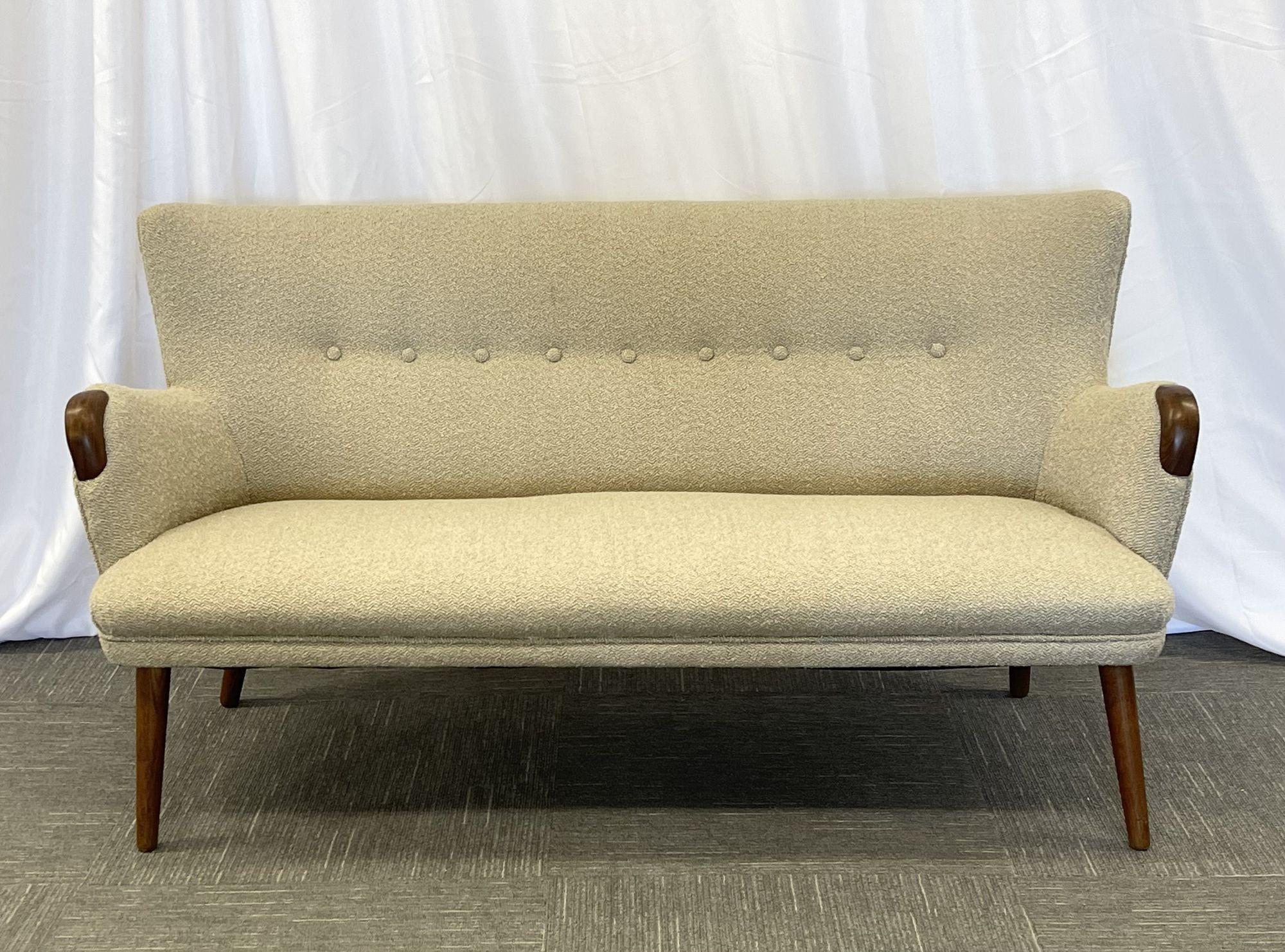 Mid-Century Modern Danish cabinetmaker sofa / settee, boucle, Goerg Thams Style
 
Chic mid-century modern designer sofa designed and manufactured in Sweden. This organic form sofa is newly re-upholstered in a gorgeous tan boucle upper. In the