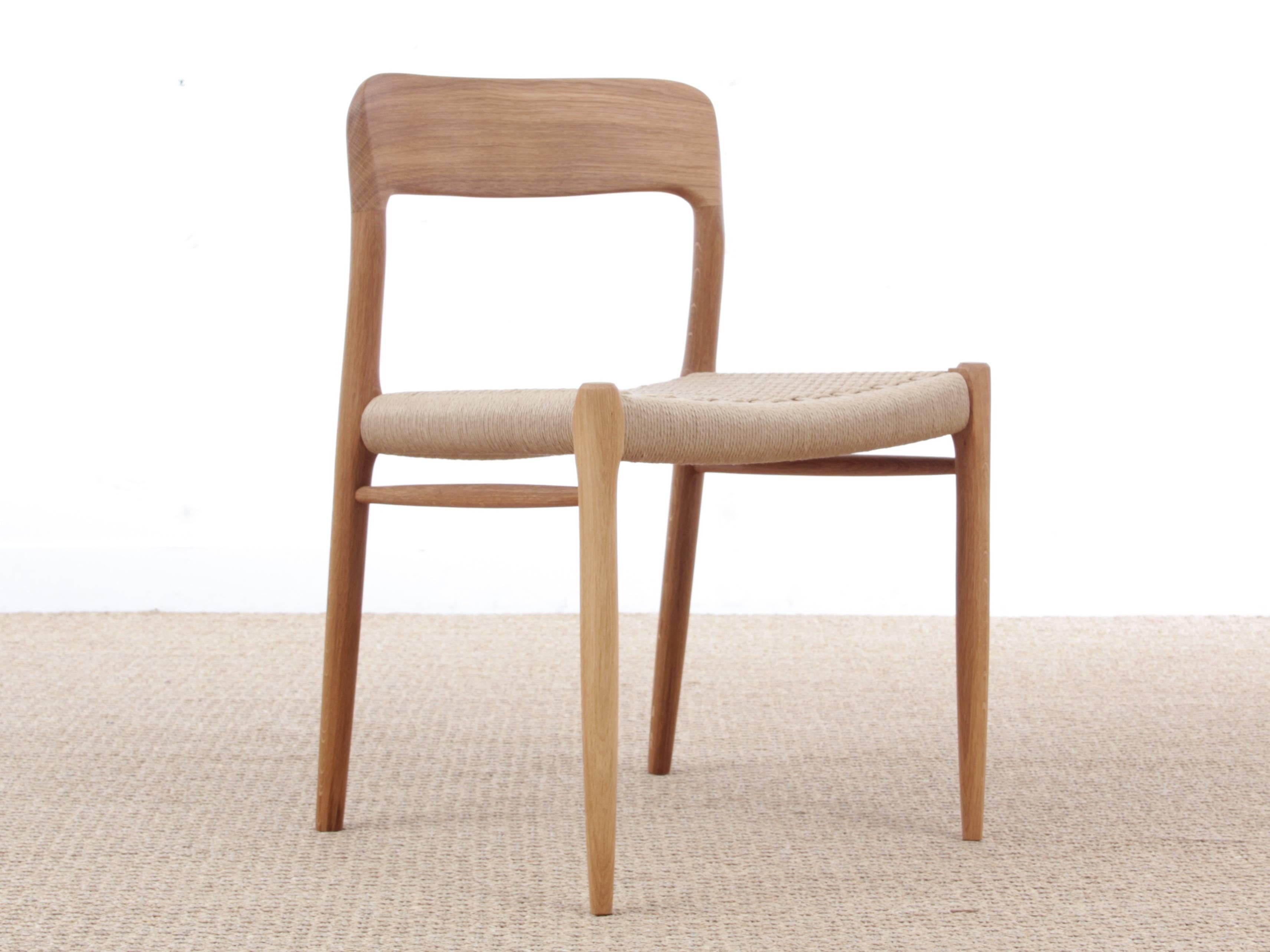 Mid-Century Modern Danish chair model 75 by Niels O. Møller. New production, still handmade in the historical Møllers workshop in Denmark.

Finish: oiled oak. Seat: natural or black papercord 