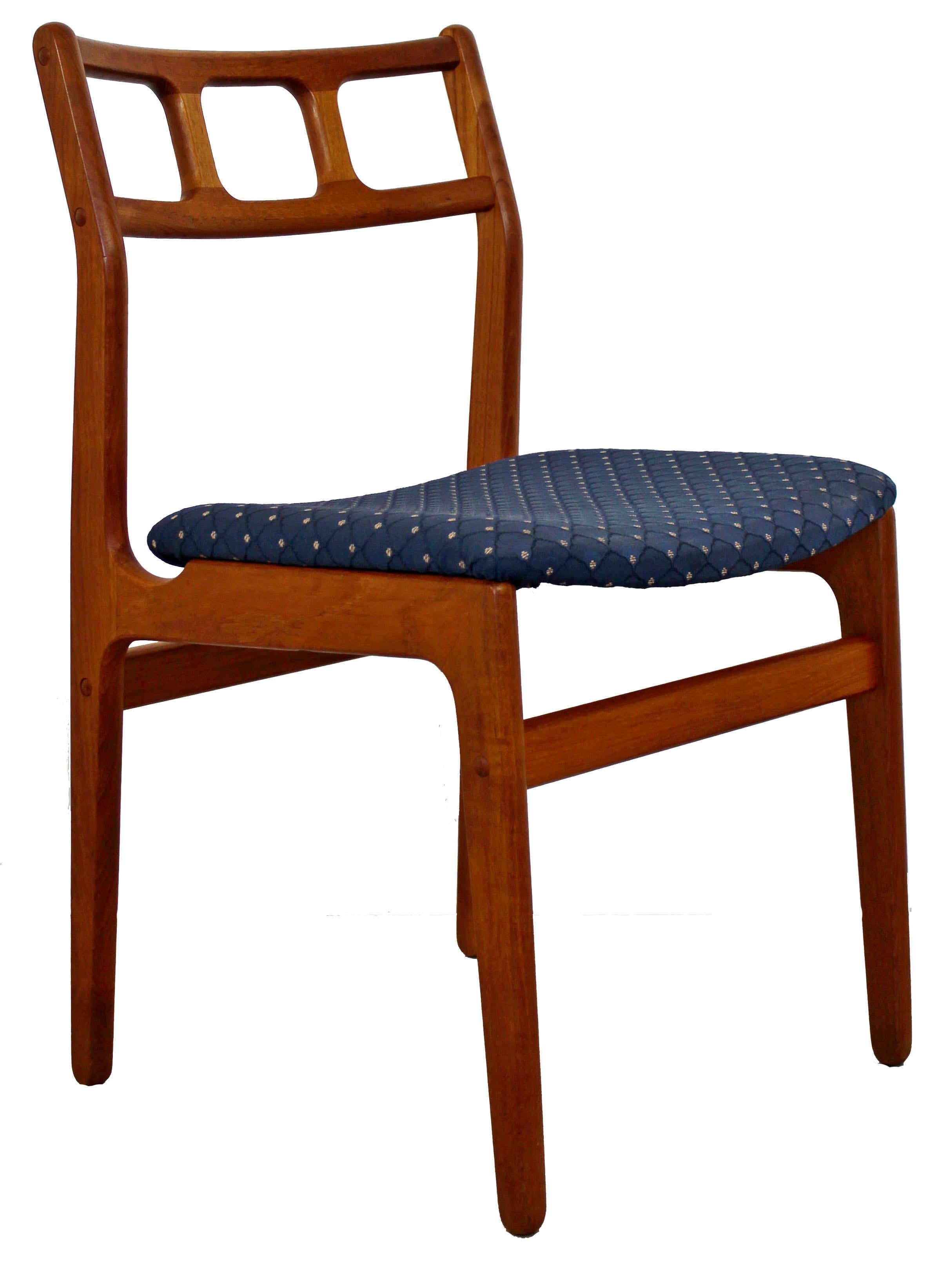 For your consideration is a stunning set of eight, Danish teak side dining chairs, by D-Scan, circa the 1960s. In excellent vintage condition. The dimensions are 18