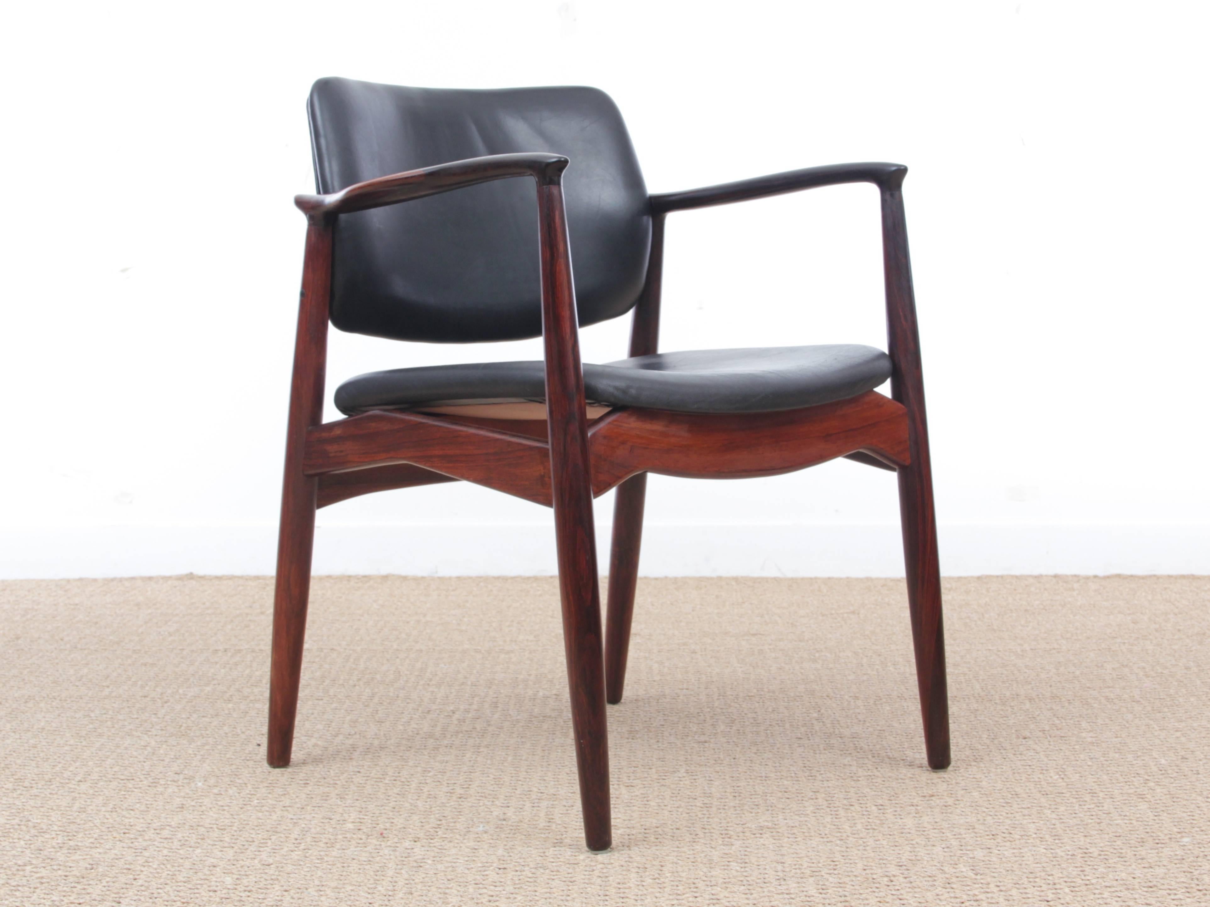 Mid-Century Modern Danish desk chair in rosewood model 66 by Erik Buck. Original leather covers. Referenced by the Design Museum Denmark under number RP17808.
