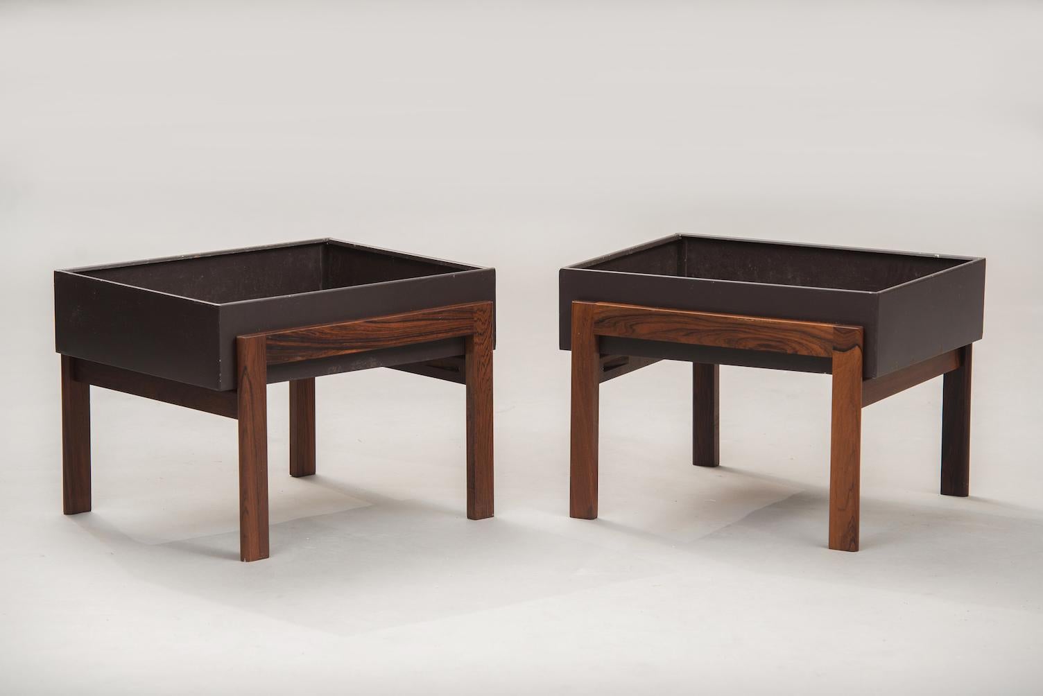 Mid-Century Modern Danish Feldballes Møbelfabrik massive rosewood and painted metal planters, one pair.
These items are in original condition, can be sold as they are or fully restored, the price shown is in original condition.
       
