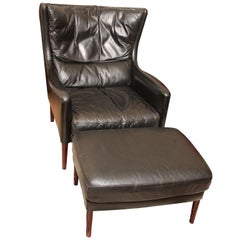 Danish Mid-Century Modern Black Leather Lounge Chair & Stool by Illum Wikkelsø