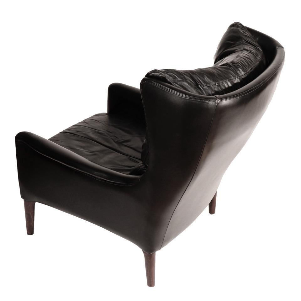 20th Century Danish Mid-Century Modern Black Leather Lounge Chair & Stool by Illum Wikkelsø For Sale