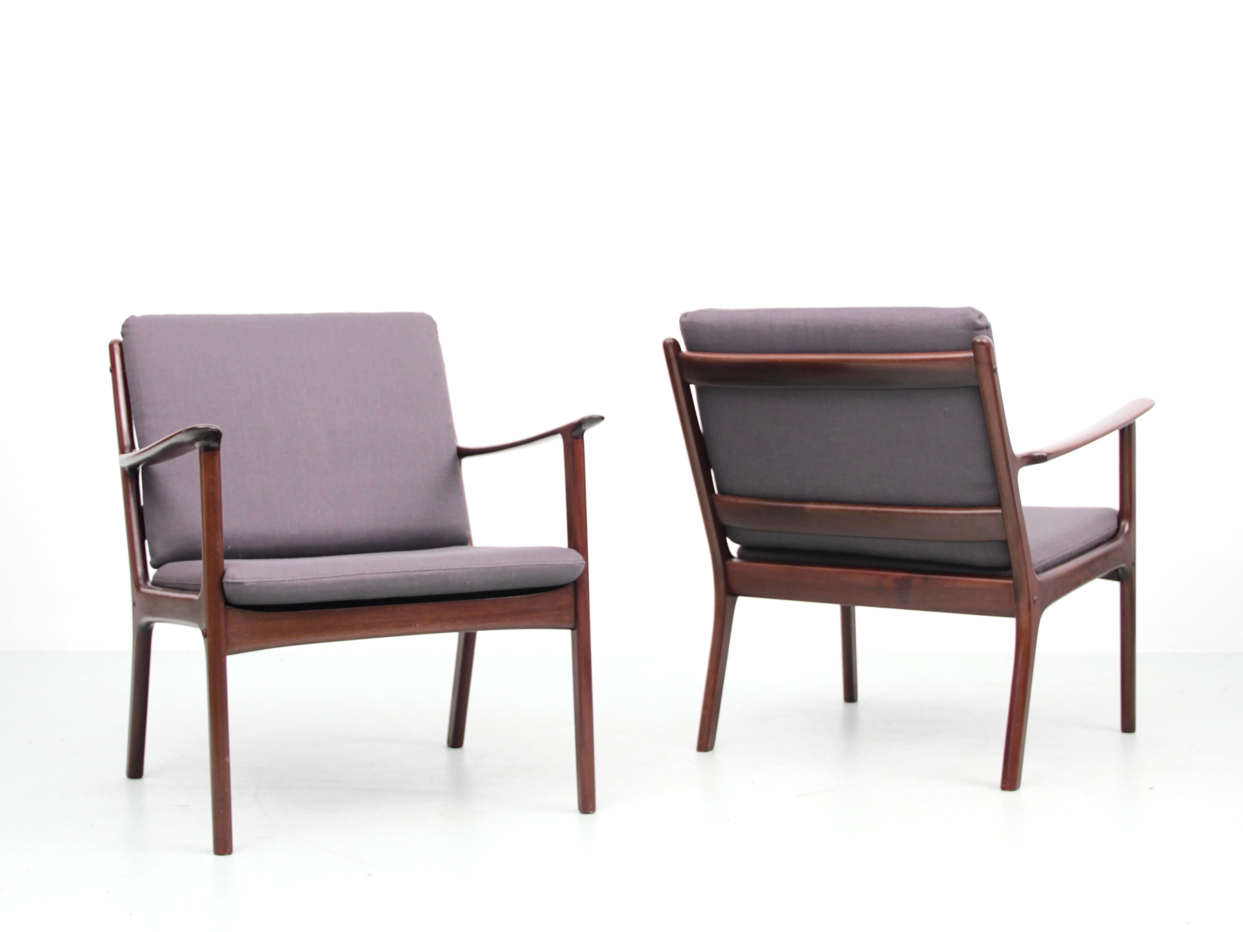 Mid-Century Modern Danish pair of  lounge chairs in mahogany model PJ 112 by Ole Wanscher. Original fabric cushions in medium condition, can be reupholstered on demand. Contact us

