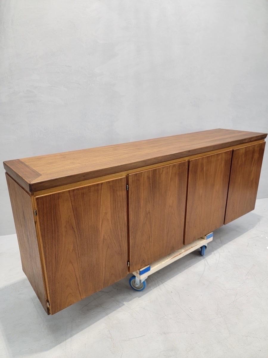 Mid Century Modern Skovby Danish Rosewood 4 Door Credenza 

The credenza/sideboard has 5 drawers and 3 shelves. 

Circa 1970

Dimensions:

H 32.5