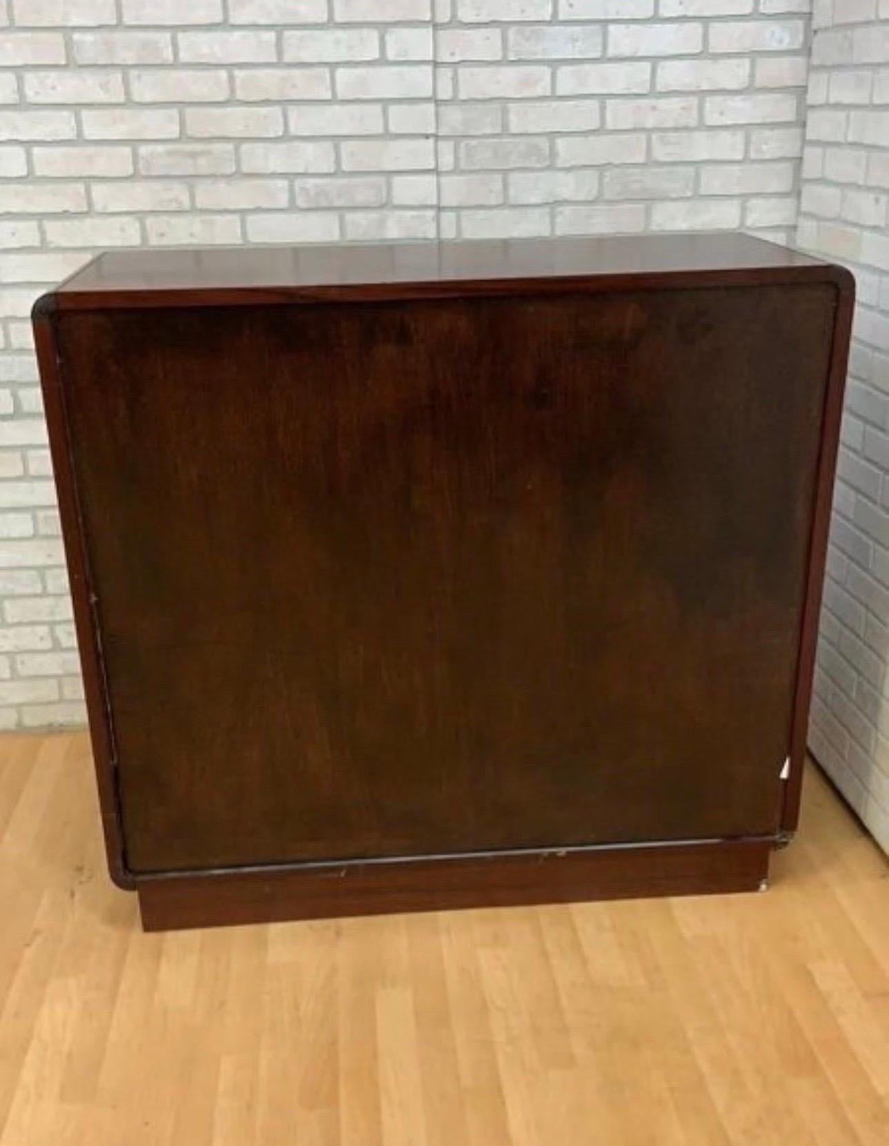Mid-Century Modern Danish Rosewood Gentleman's Cabinet/Armoire

Gorgeous Mid-Century Modern Danish Rosewood Side By Side Dressing Cabinet/Armoire. This Chest is Beautifully Crafted in a Gorgeous Finished Rosewood and Features 5 Storage Drawers and