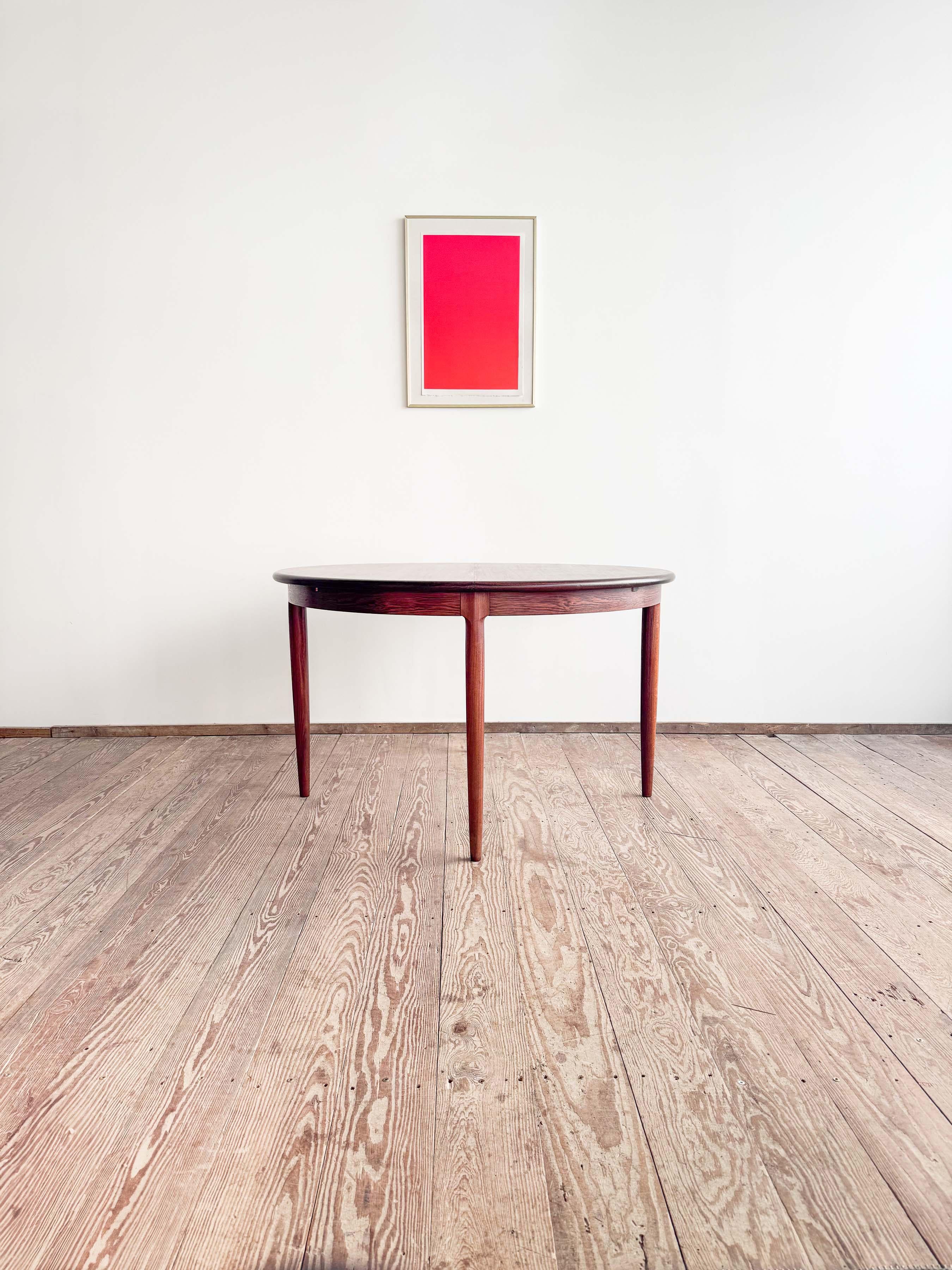 Dimensions: D / L x H 122.5 / 174 x 72.5 cm (48.2 / 68.5 x 28.5 inches)

A very elegant Danish dining table by Niels O. Møller for J.L. Møller, Denmark, 1950s. The table impresses with its simple round shape and beautifully crafted, tapered legs,