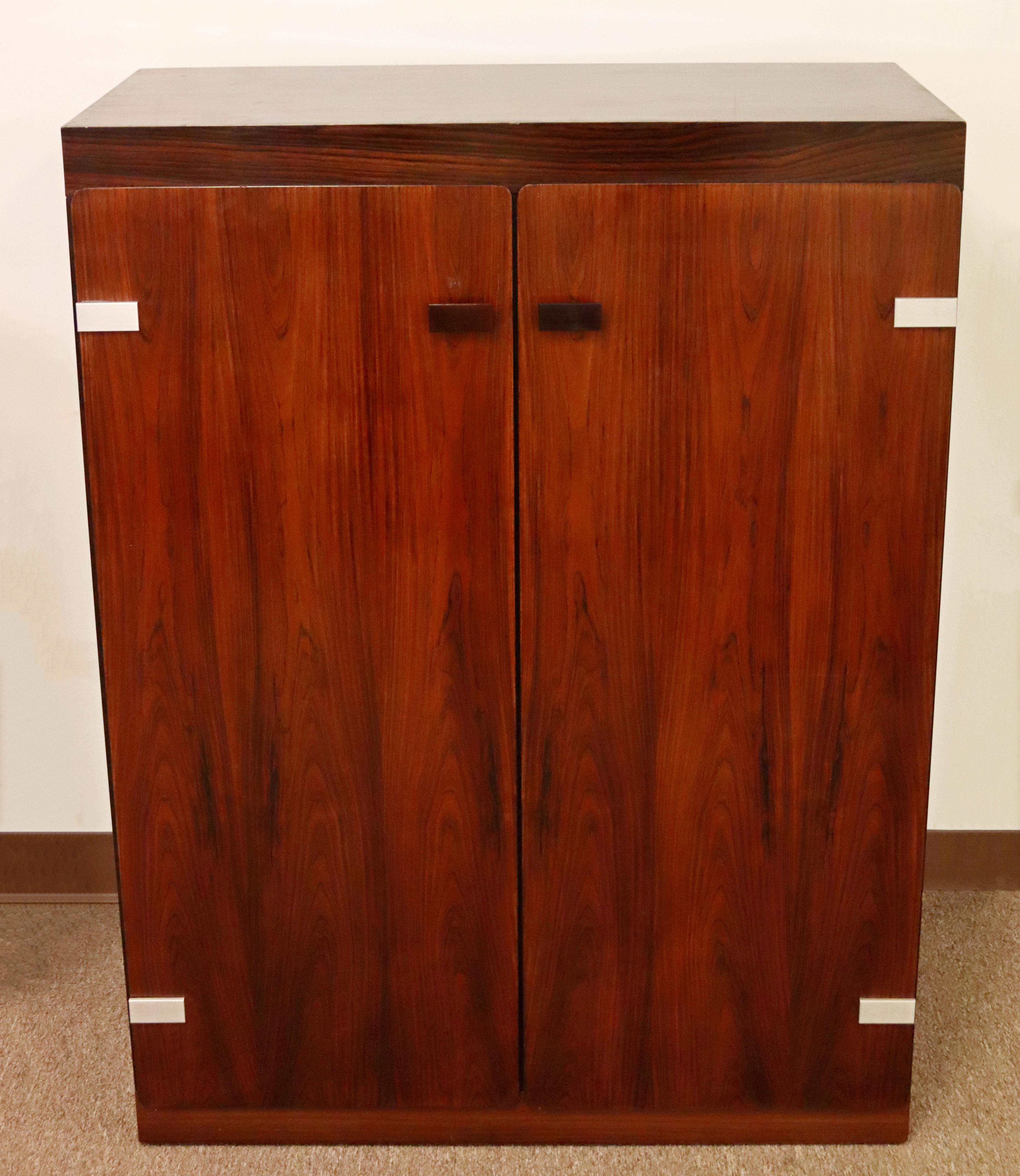 For your consideration is a superb, rosewood bar cabinet, with three shelves and six shelves, by Mobler, made in Denmark, circa the 1960s. In excellent vintage condition. The dimensions are 33.5