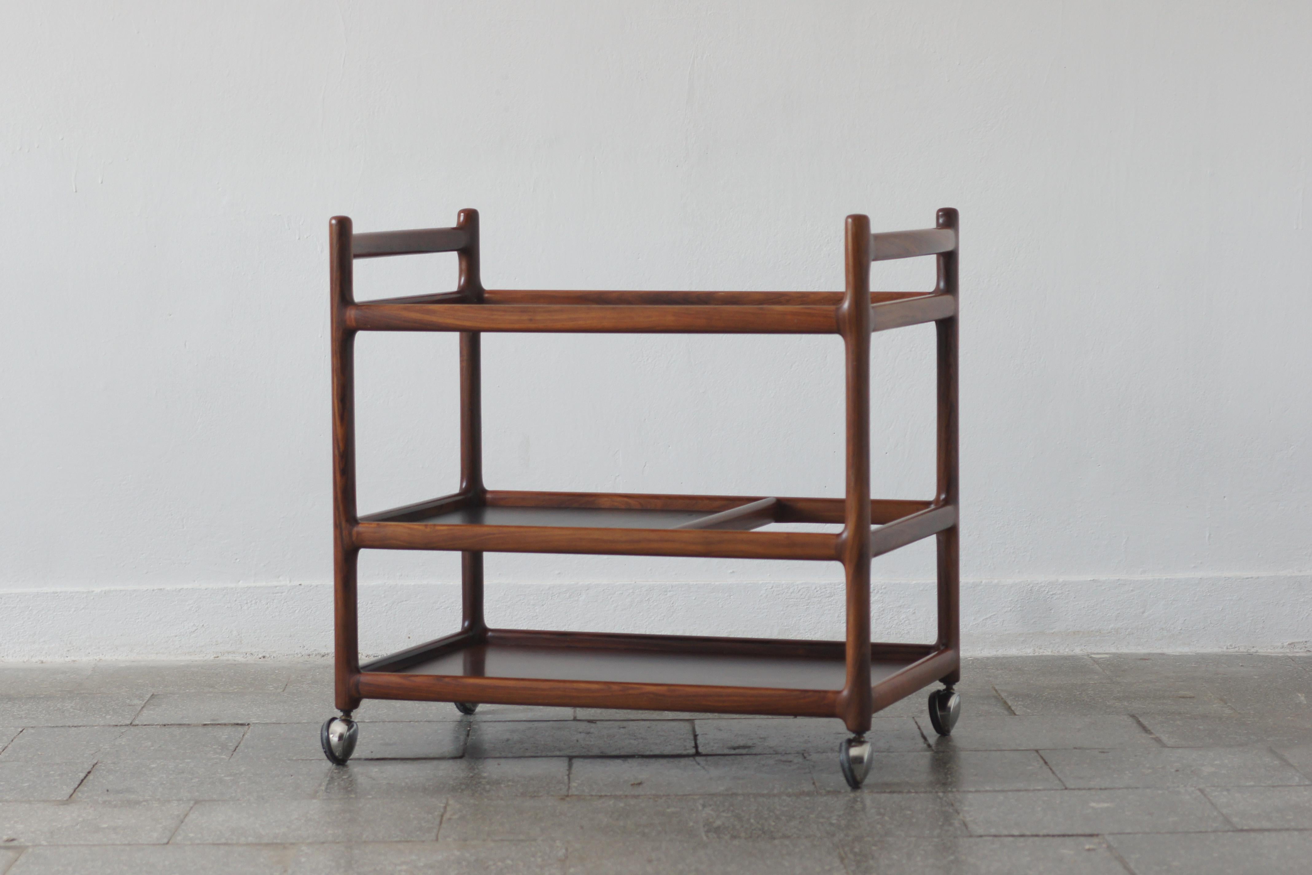 The 1960s bar designed by Henning Korch for CF Christensen Silkeborg is a quintessential piece of Danish modernism - elegant, compact and made with attention to every detail.

This bar is not only a functional piece of furniture, but also a piece of