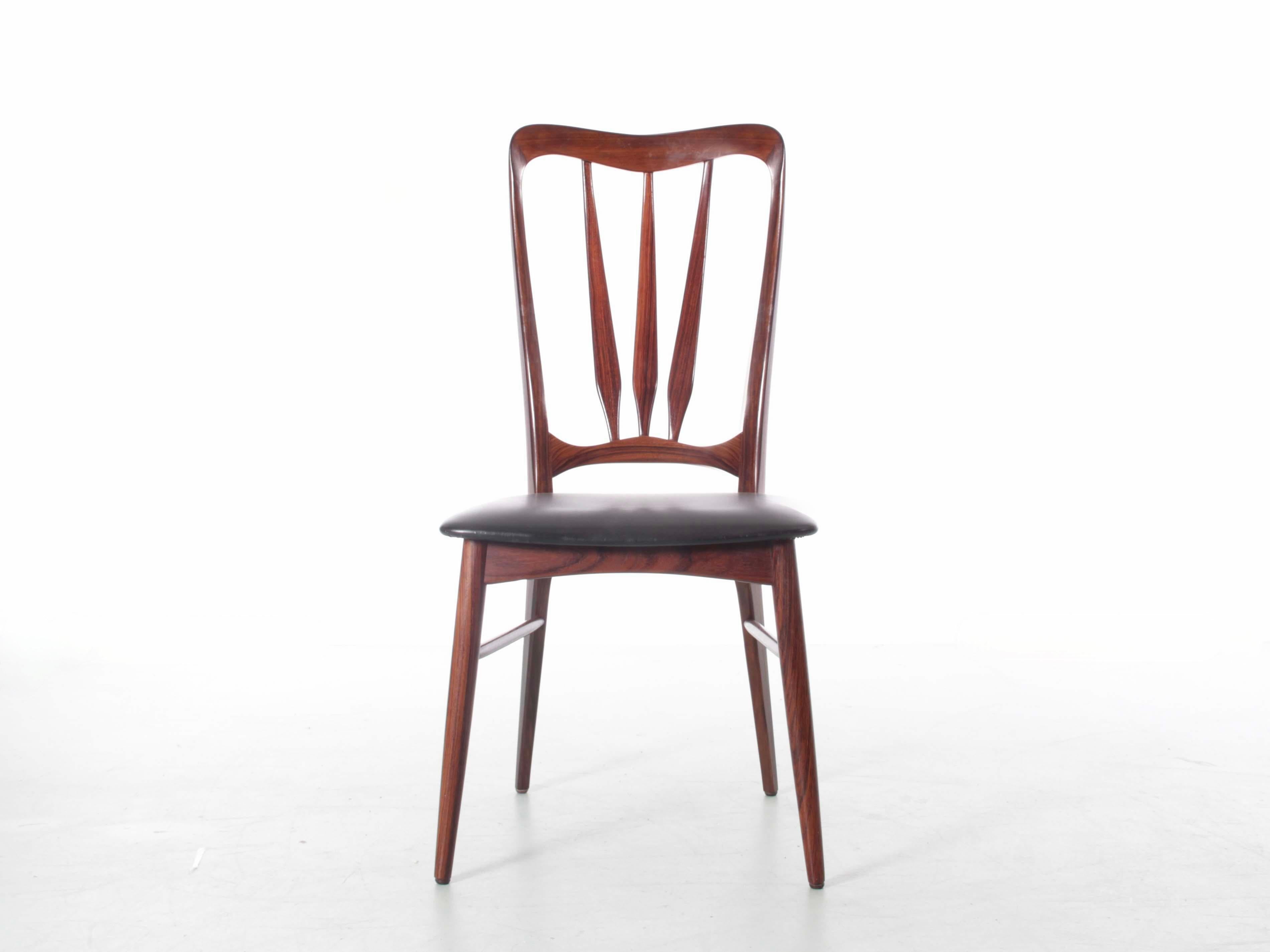 Mid-Century Modern Danish set of 4 chairs in rosewood model Ingrid by Niels Koefoed. Original simil leather.

   