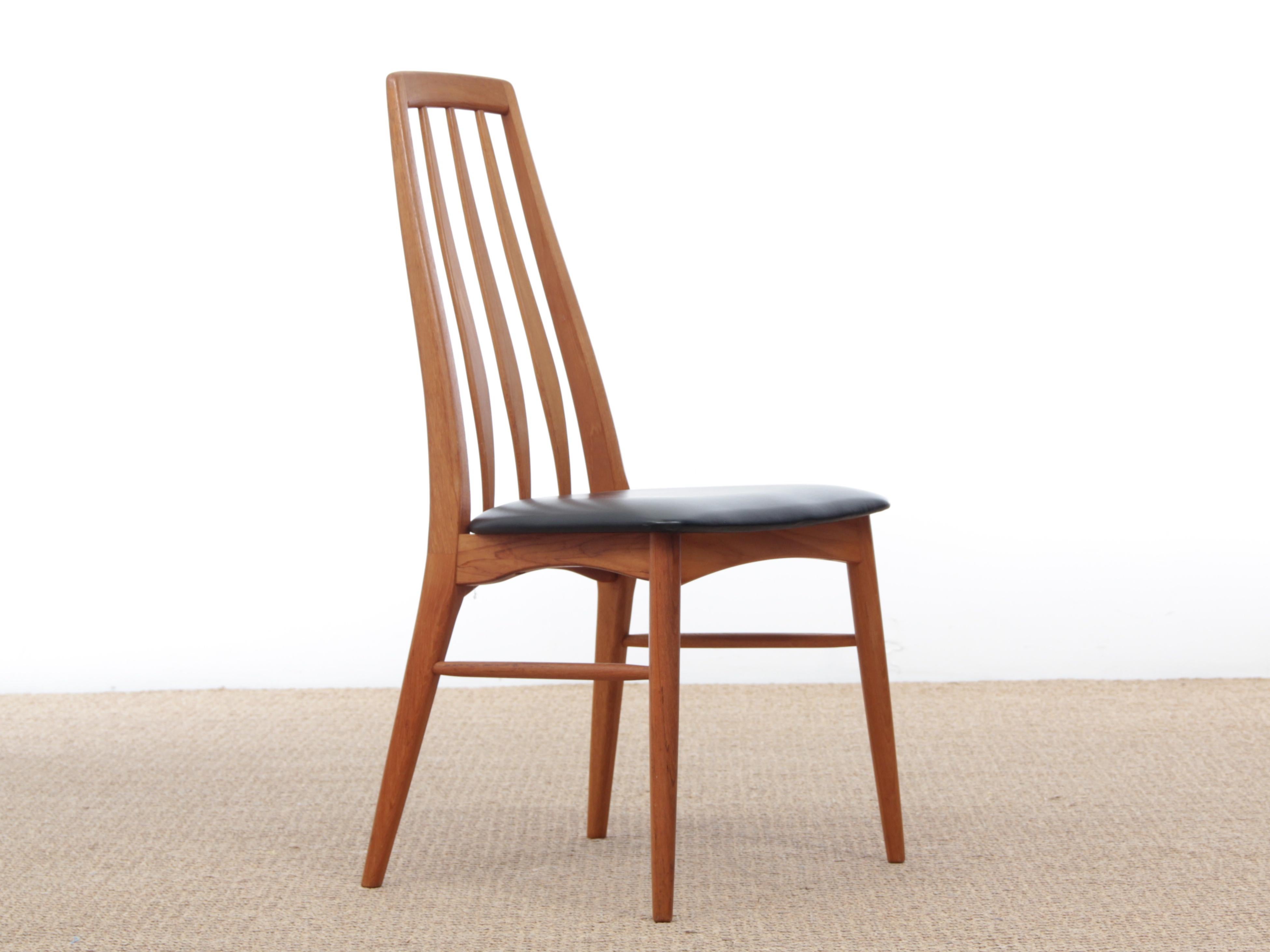 Mid-Century Modern Scandinavian set of 4 teak chairs modele Eva by Niels Koefoed. Black simili leather seat.
  