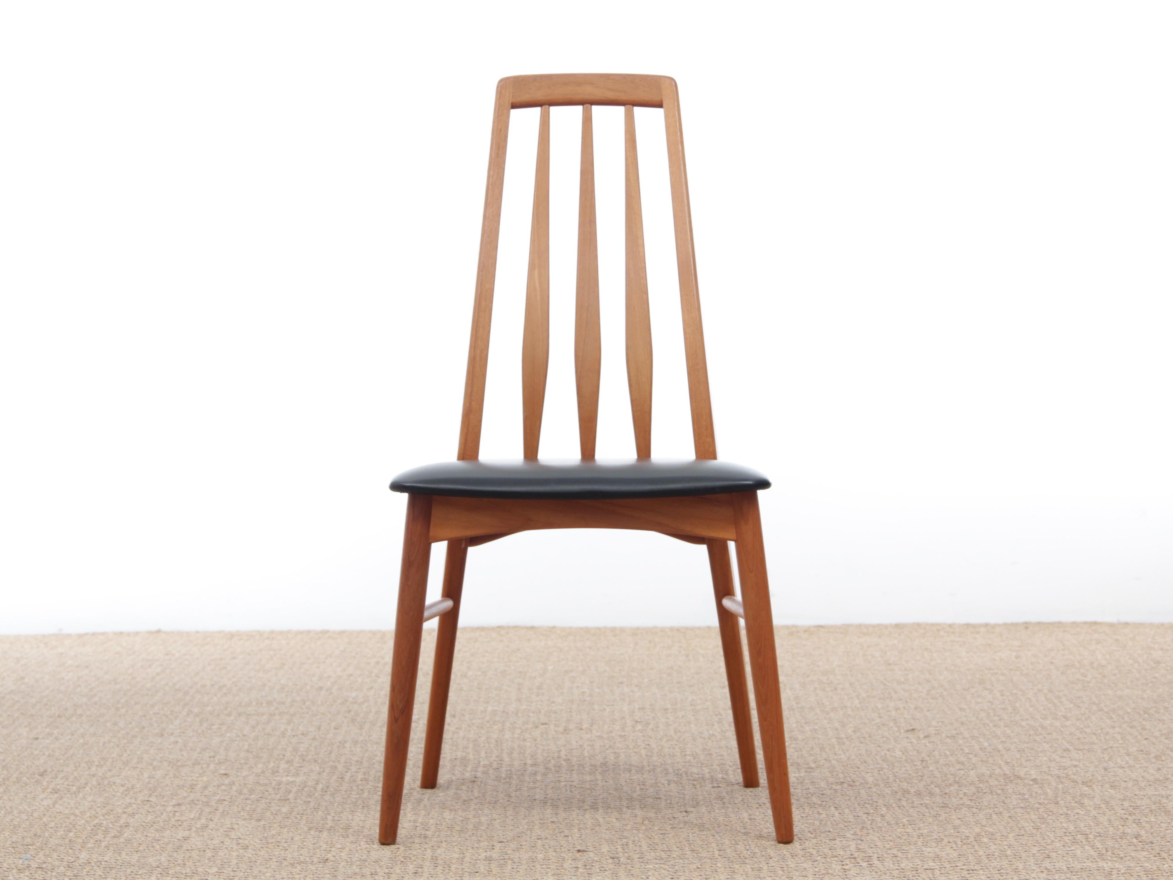 Mid-Century Modern Scandinavian set of 4 teak chairs model Eva by Niels Koefoed. Black leather seat.
        
