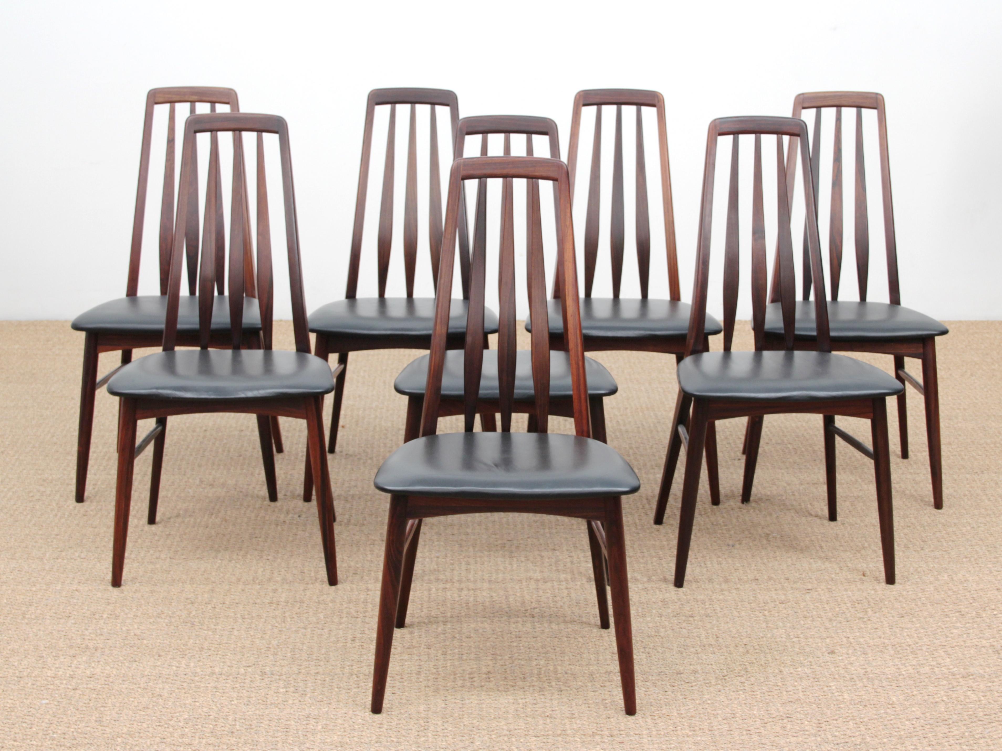 Mid-Century Modern Danish set of 8 chairs in rosewood model Eva by Niels Kofoed. Original black leather.
 
