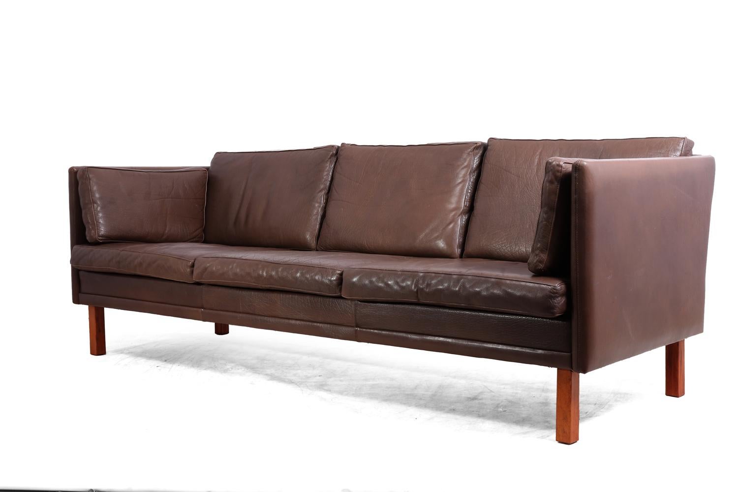 Mid-Century Modern Danish Sofa
A thick brown leather three-seat Danish sofa, very good condition with no rips tears or repairs

Age: 1960

Style: Mid-Century Modern

Material: Leather

Origin: Denmark

Condition: Very good, minimal wear