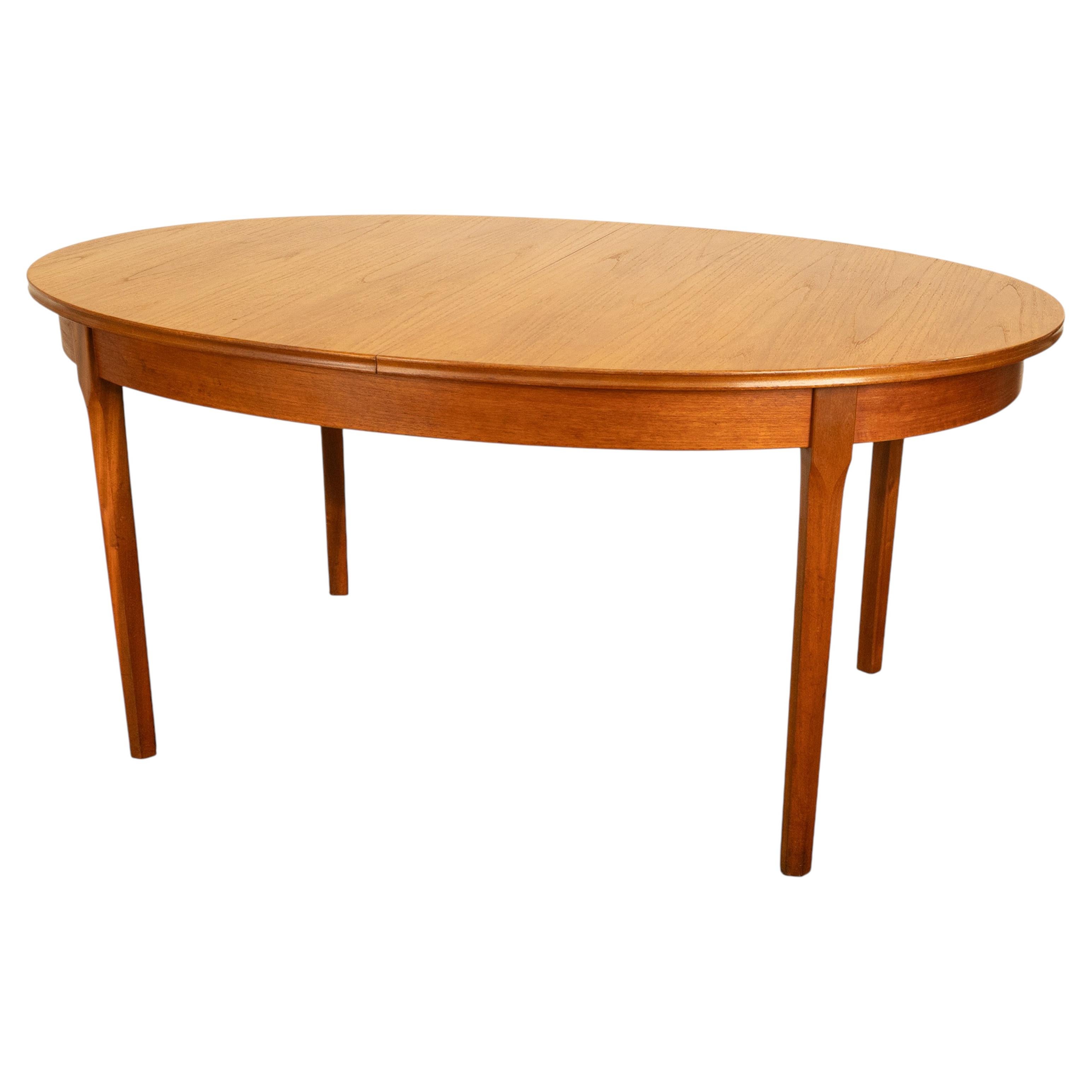 What is a butterfly leaf in a dining table?