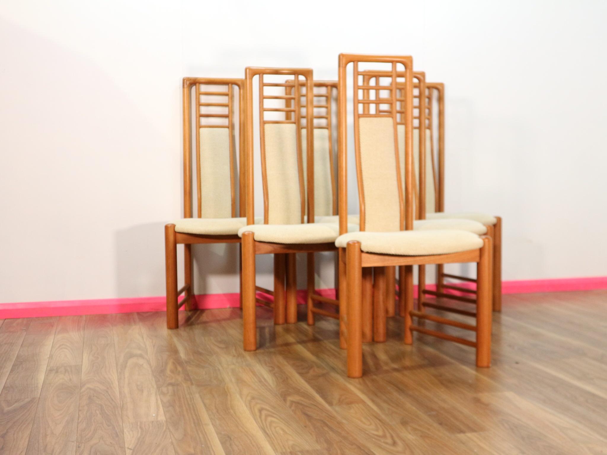 This set of Danish dining chairs are a true statement piece. With their high backs and great shape they really stand out from the crowd and are a great example of Danish design and build quality with a gorgeous grain within the wood frames.