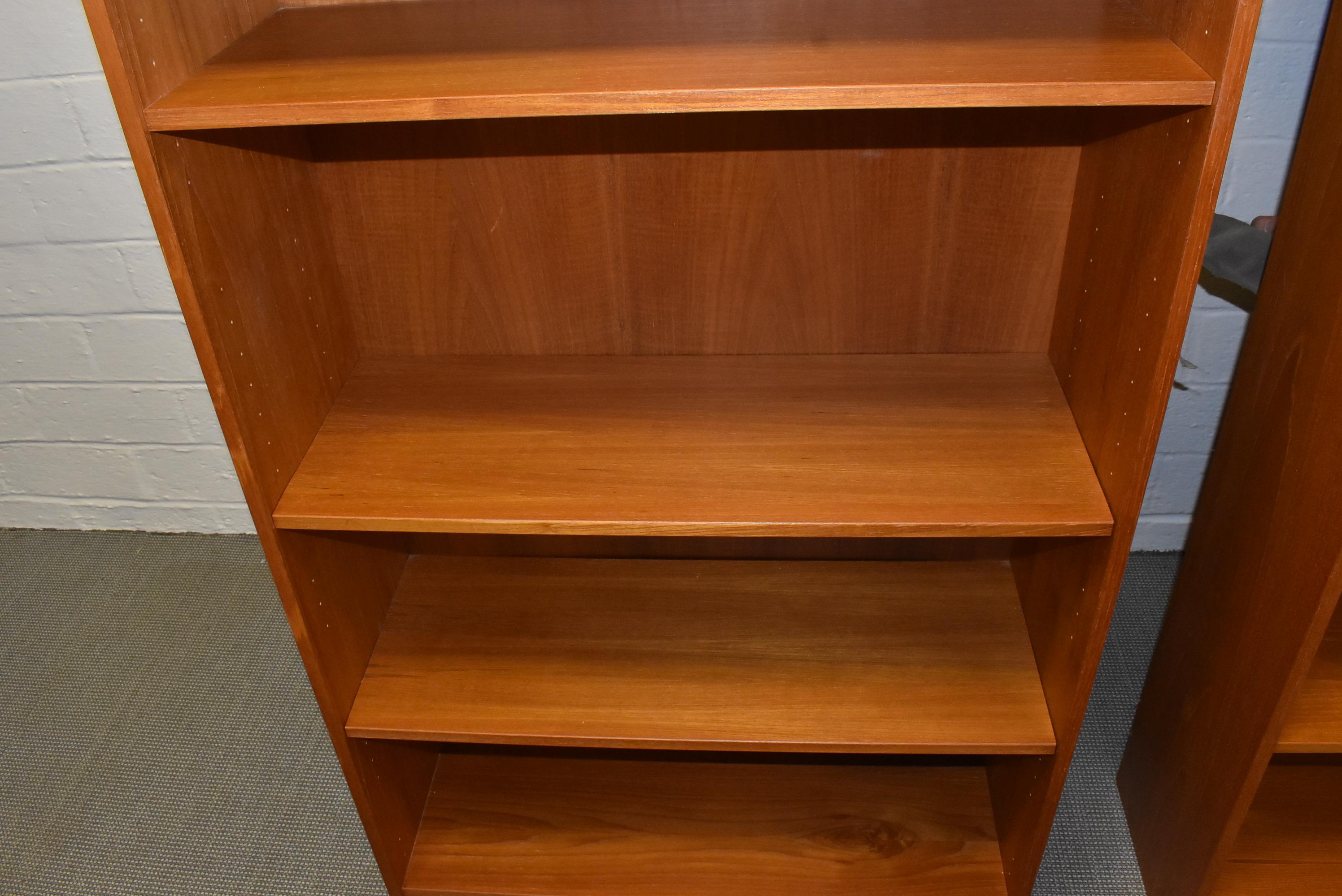 Mid-Century Modern Danish teak bookcase. Original finish by Domino Mobler. Very nice condition. Measures: 31