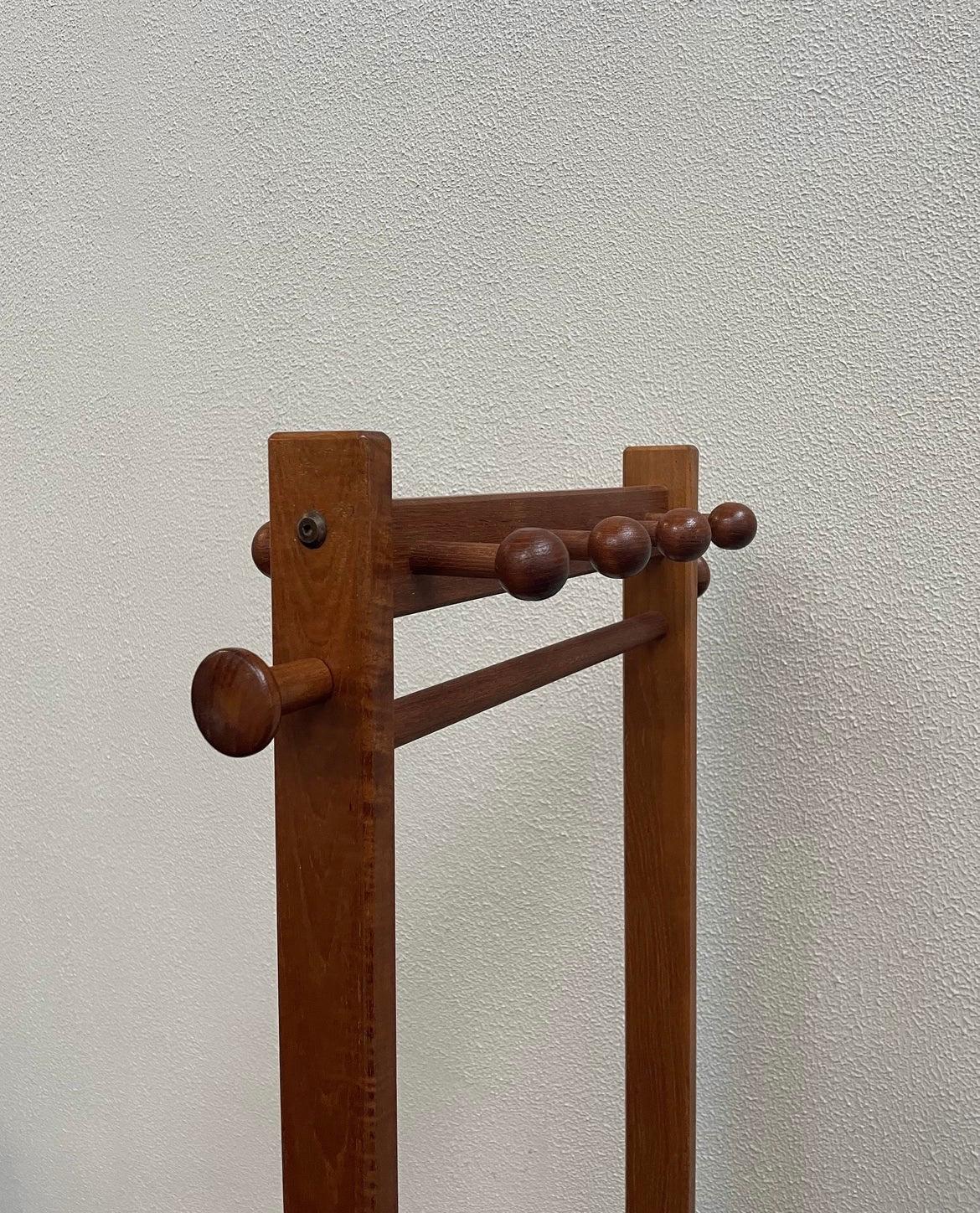 PBJ Mobler manufactured, solid teal coat rack. 1970s Danish Mid-Century, versatile piece with a wooden rod and 12 knob hooks.