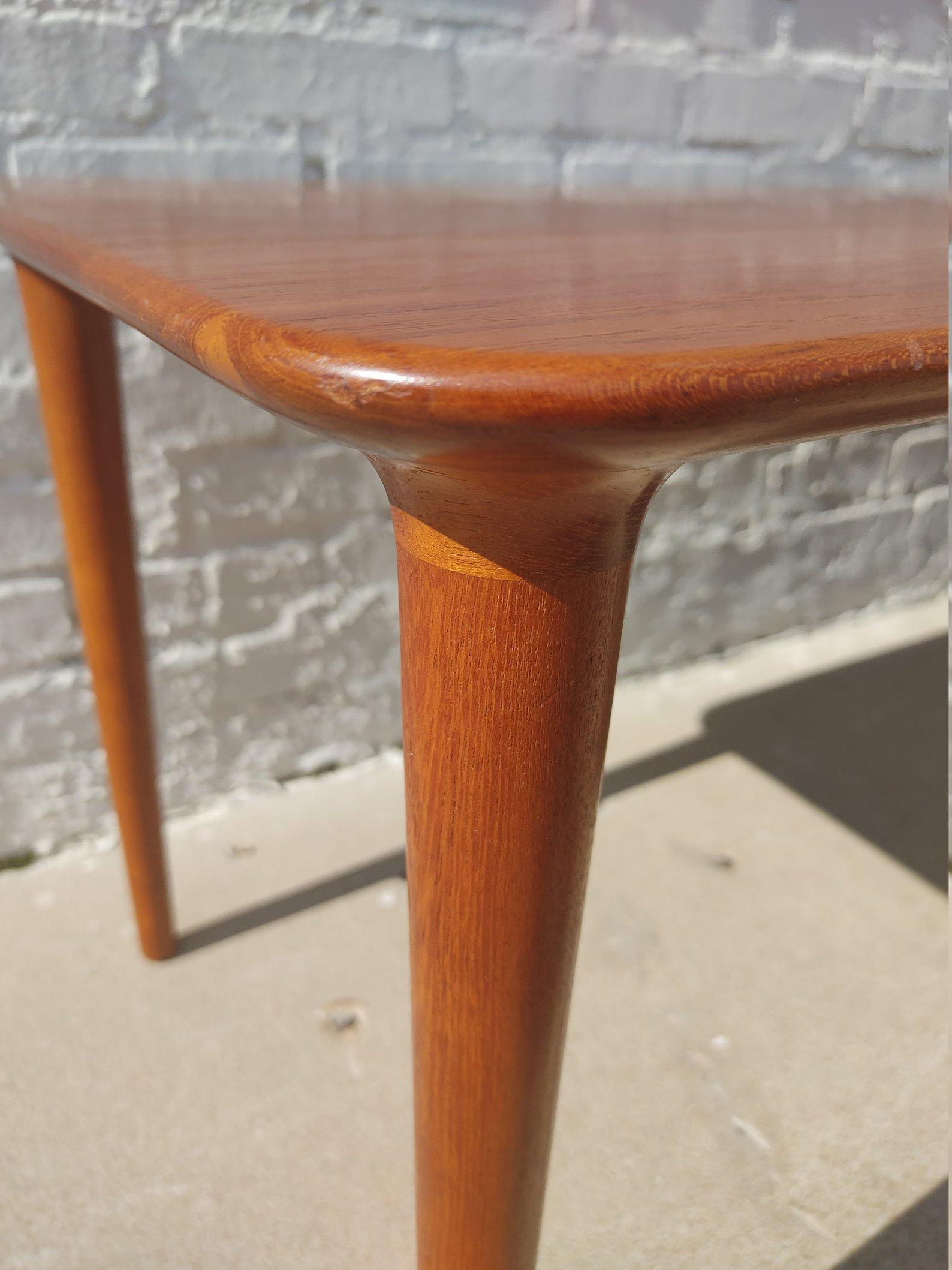 Mid Century Modern Danish Teak Coffee Table by Bramin 

 Above average vintage condition and structurally sound. Has some expected slight finish wear and scratching. Table has a slight split where the solid wood planks have been glued together.