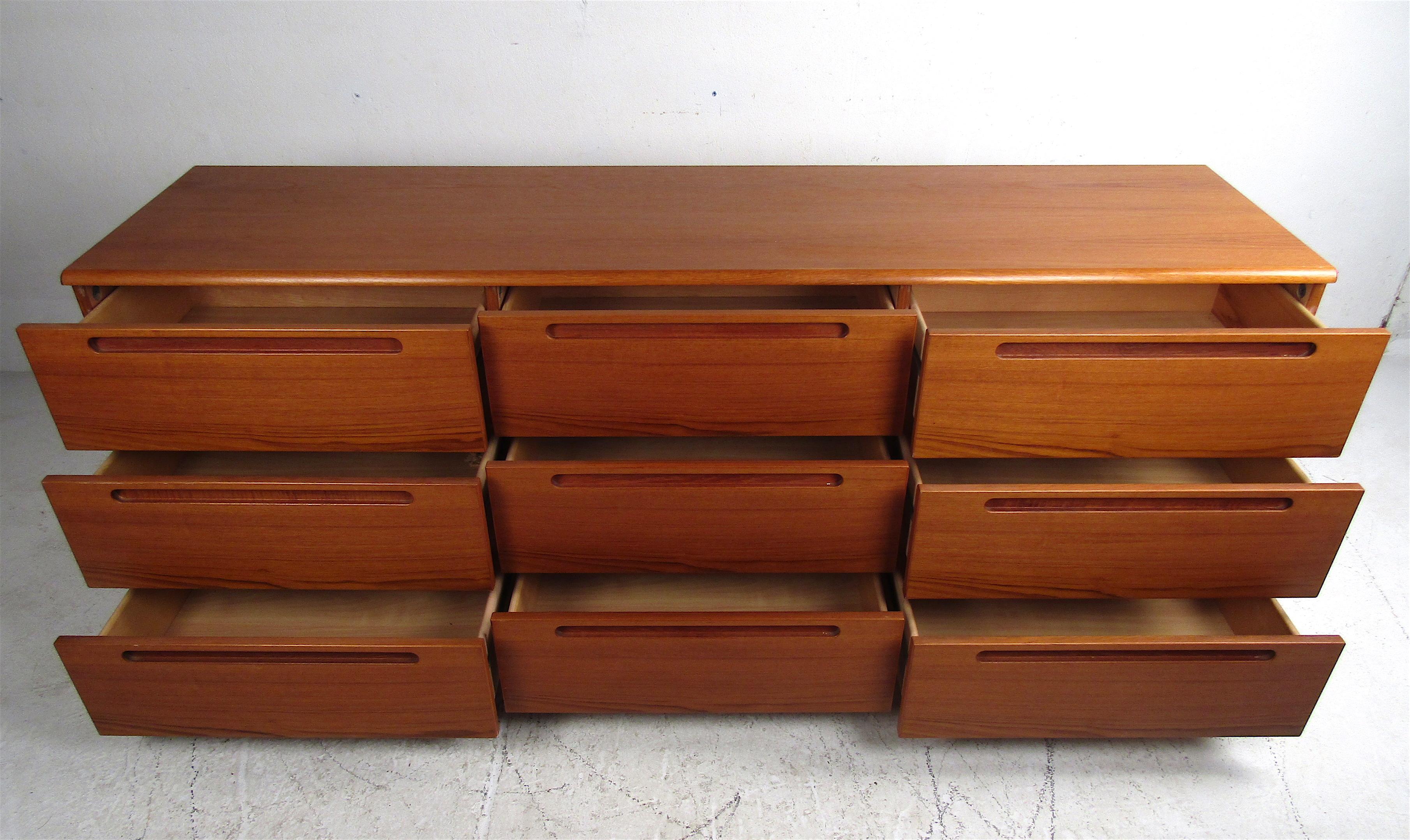 Late 20th Century Mid-Century Modern Danish Teak Nine-Drawer Dresser