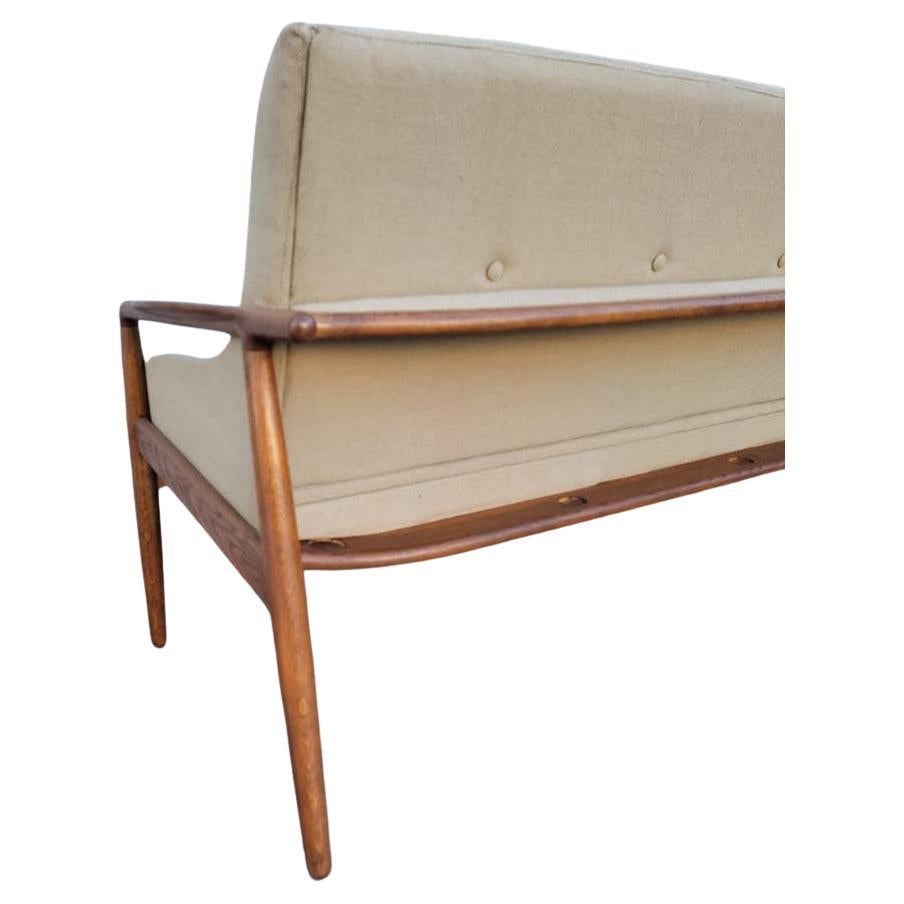 Mid Century Modern Danish Teak Settee Newly Reupholstered in In Neutral German Linen Blend 

Introducing Mid Century Modern Danish Teak Settee, a timeless piece that seamlessly blends style and comfort. This settee has been restored and newly