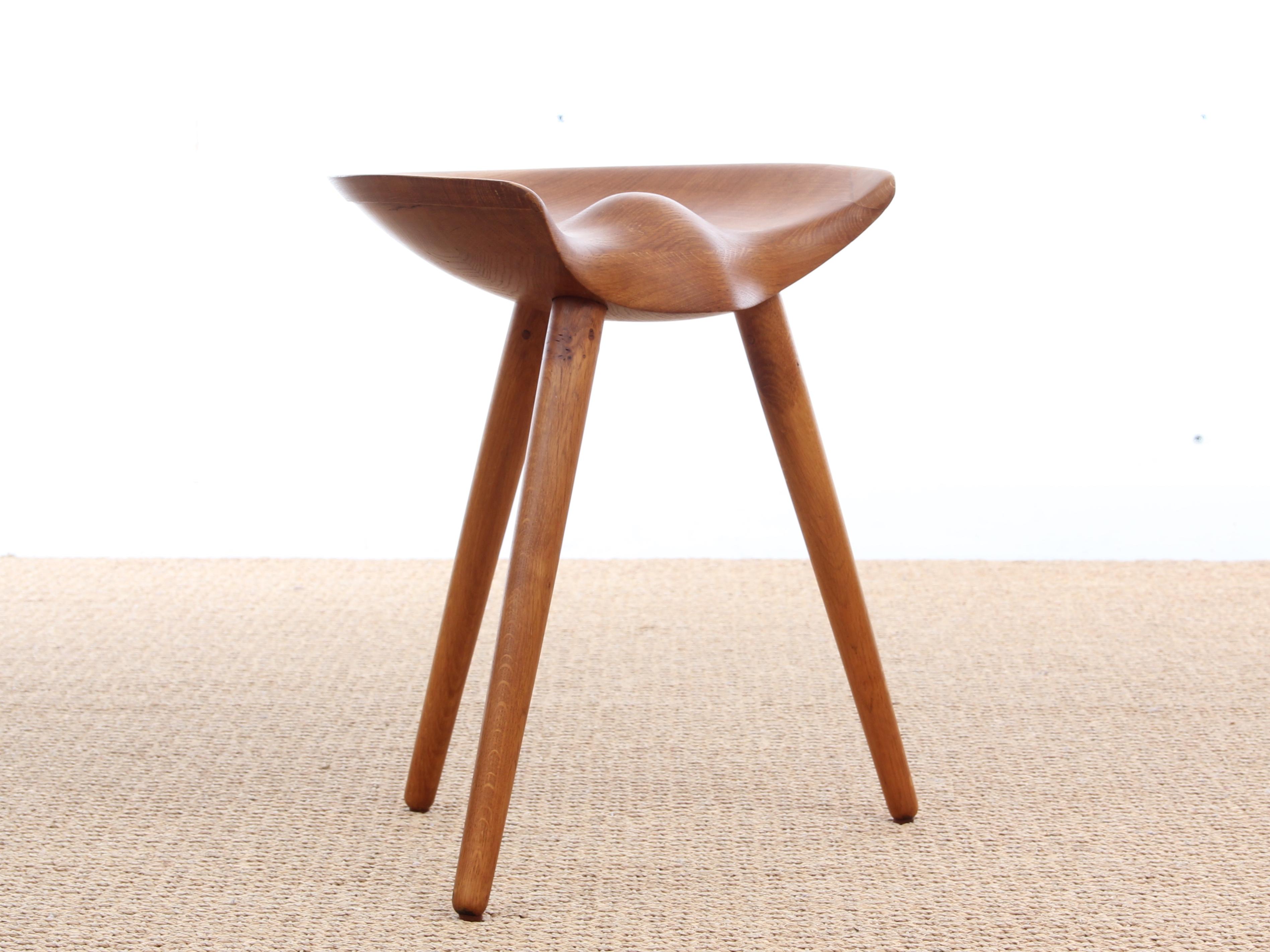 Solid oak stool by Mogens Lassen, designed in 1942. Original edition produced by K. Thomsen and labelled. Old restoration trace in the left corner. Feet devisables.

Model presented at the 