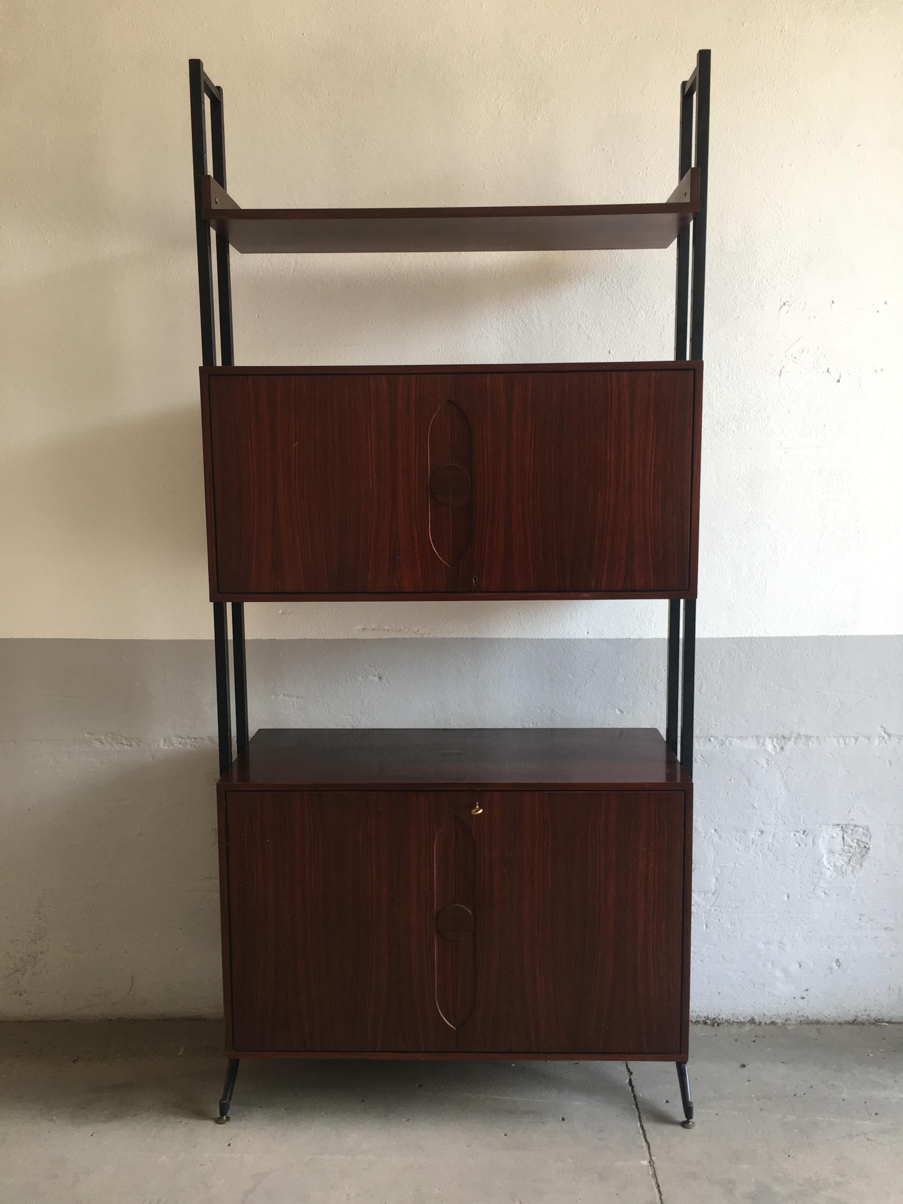 Mid-Century Modern Danish wood wall unit with double cabinet and shelves.