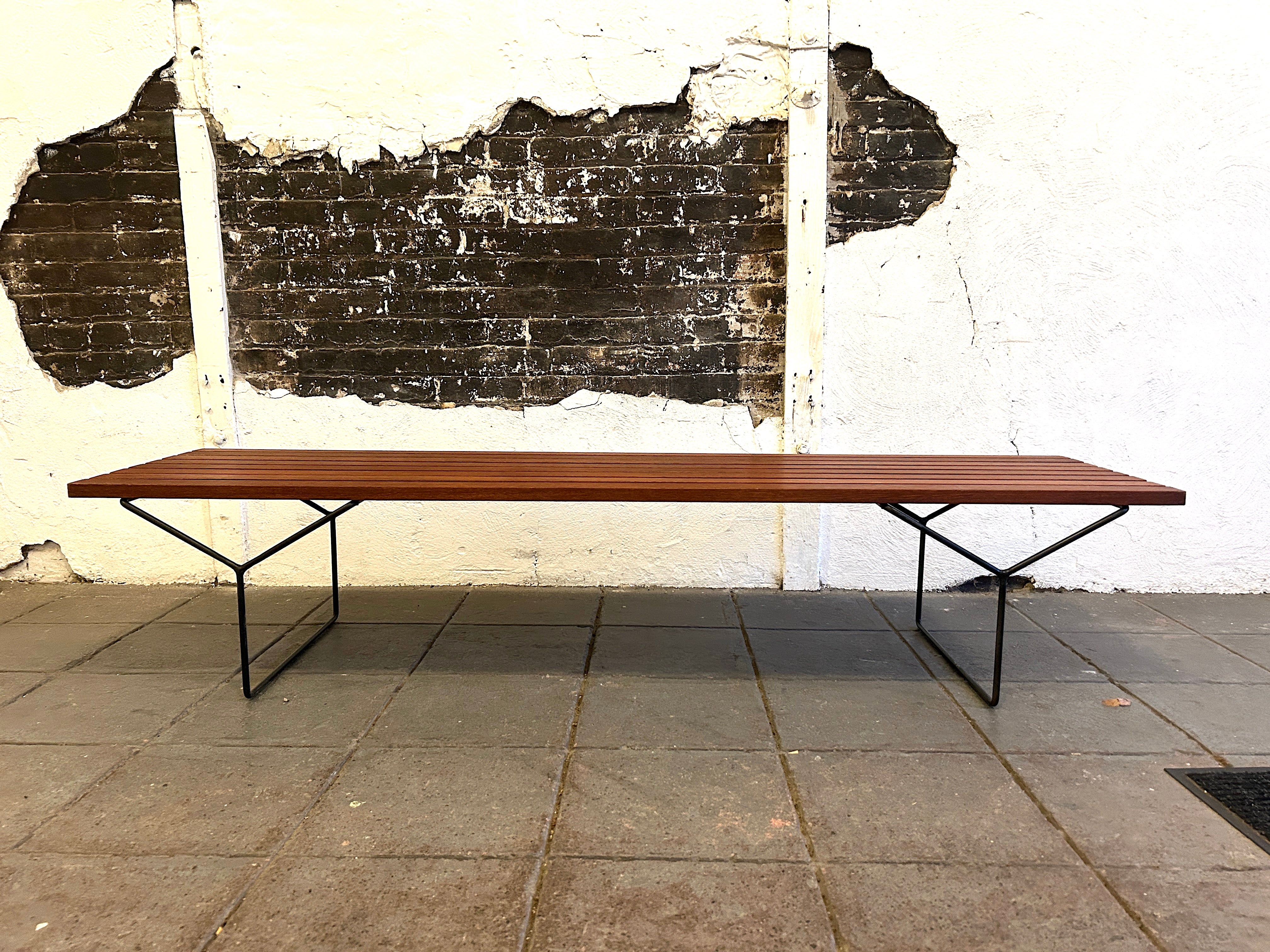 Wonderful mid-century slat bench or coffee table designed by Harry Bertoia for Knoll 1970s. Dark brown Stained Hardwood with welded Iron legs. Not Labeled. Located in Brooklyn NYC.

Iconic mid-century design!


 