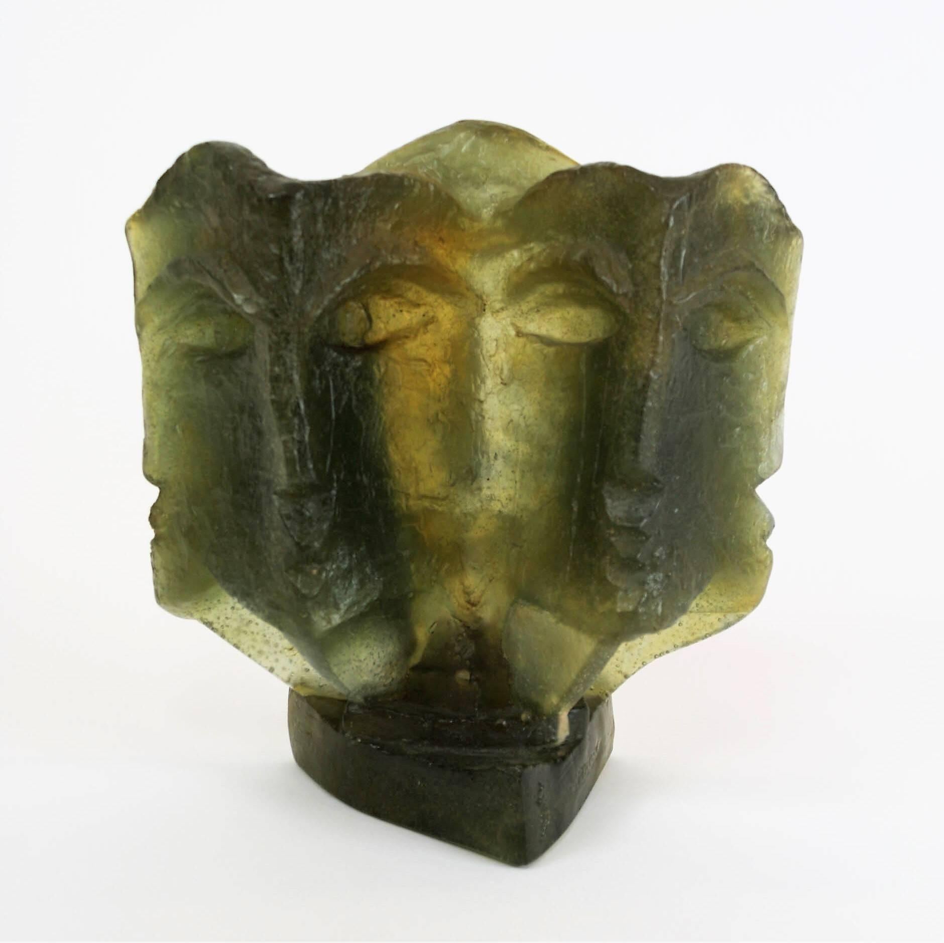 Abstract face in translucide molten glass edited  by DAUM  for the sculptor Bernard Citroen.
Cubist abstract shape, bottle green and amber pâte de verre sculpture, signed on the base Daum France, Citroen.